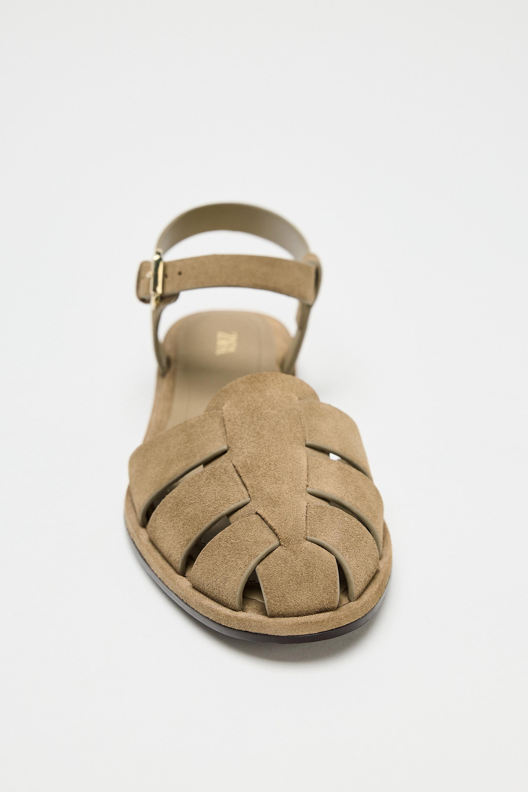 Split leather flat fisherman sandals. Flat sole. Adjustable side buckle closure. Round toe.Sole h... | Zara US