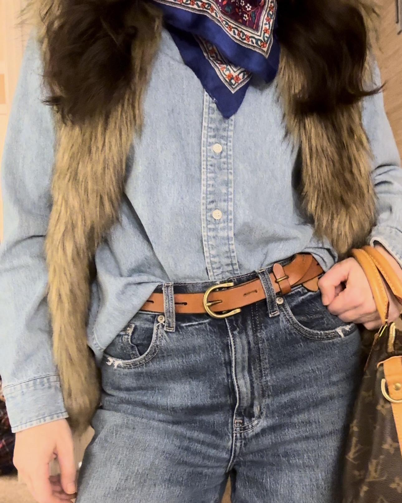 All about denim this season! 💙 Loving this layered look with a classic Ralph Lauren button-down, Dazed Jeans, and suede brown boots from Amazon. Added a pop of texture with a chic fur vest and a silk scarf you can style in any color. Perfect for a cozy winter vibe! ❄️✨ #DenimOnDenim #WinterStyle #LTKfashion

#LTKParties #LTKHoliday #LTKU