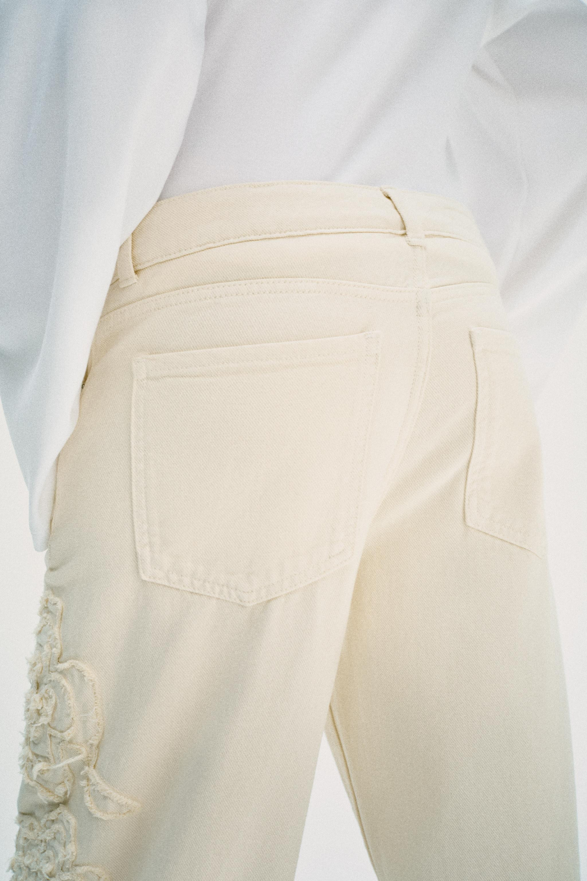 Model height: 178 cmMID-WAIST - WIDE-LEG - STRUCTURED FLORALMid-waist jeans with a five-pocket de... | Zara UK