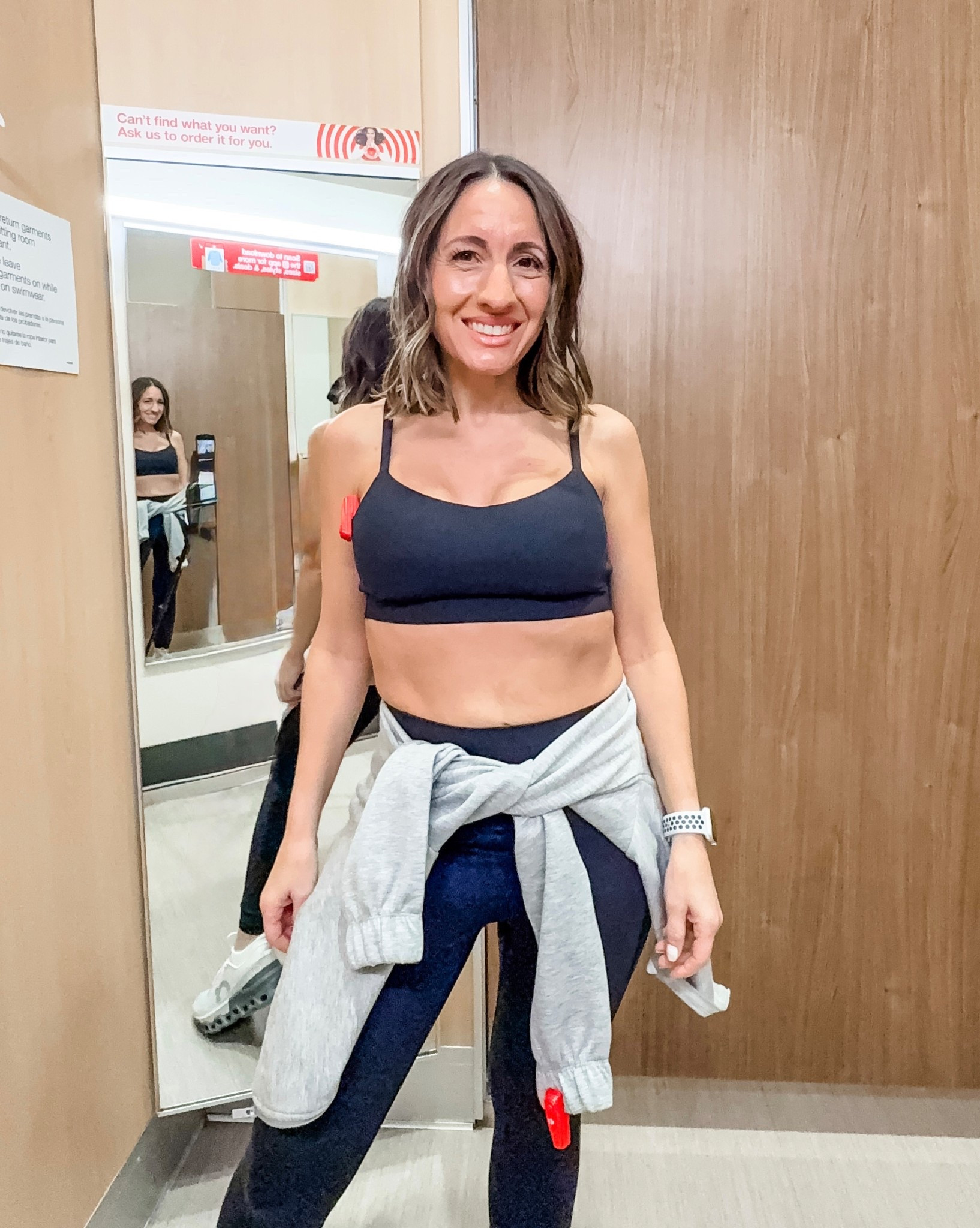 Workout clothes are just better when they are cute. 
Black sports bra with fun detail on the straps. Runs tts. Wearing a small. 
Black workout leggings. Run tts. They don’t have amazing stomach control, but I’m linking a few pairs I have and swear by. 
On Cloud sneakers are very comfy. 
Petite style 

#LTKPetite #LTKOver40 #LTKActive