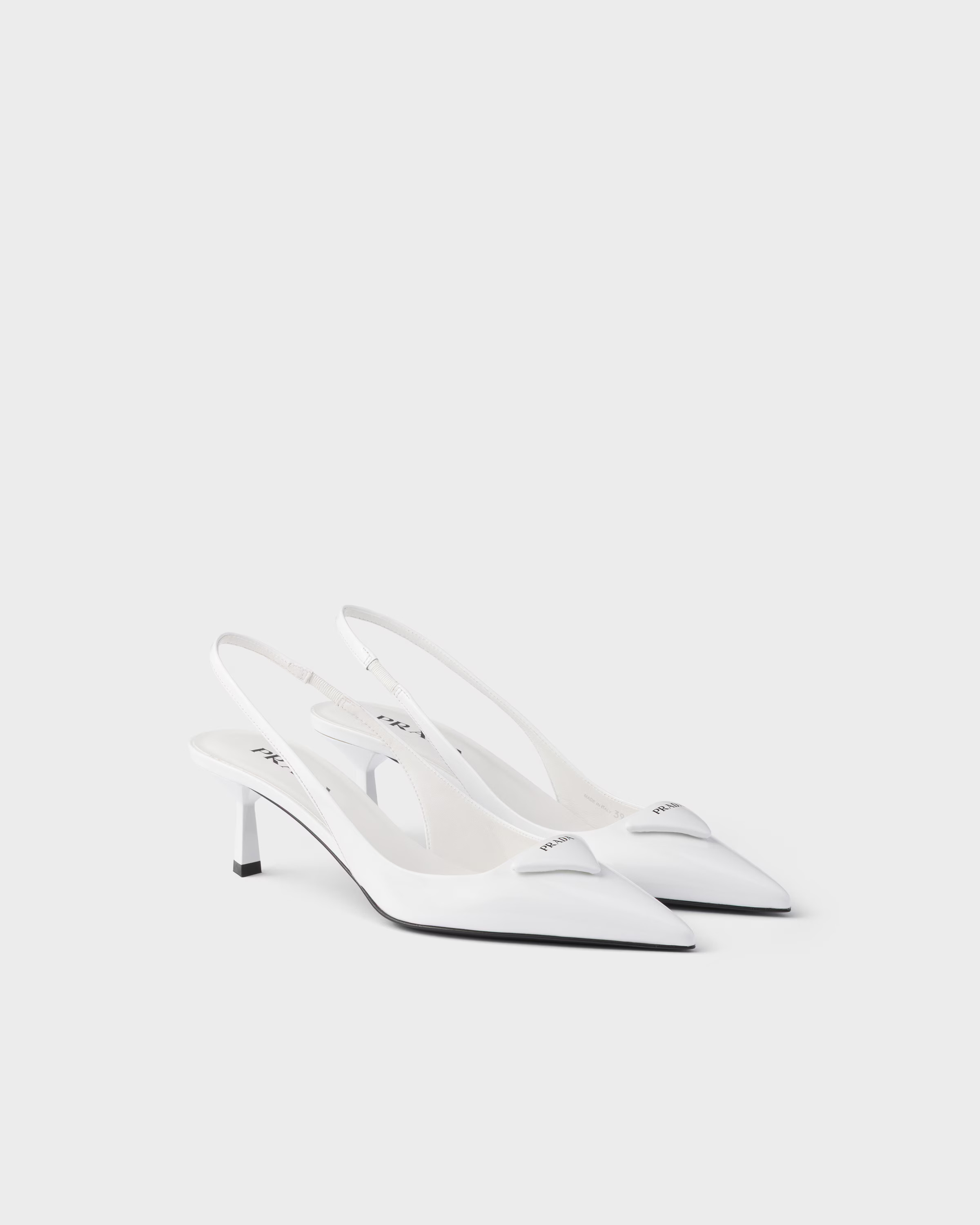 Patent leather slingback pumps | Prada US