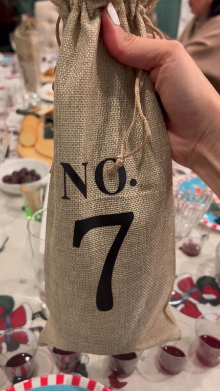Friendsmas Idea: Host a Wine Off for your next girls party!  These wine bottle covers are perfect for a blind wine tasting party.  Everyone brings their favorite bottle of wine and you vote on your favorites for the winner!  Take turns hosting!  

#LTKSeasonal #LTKparties #LTKHoliday