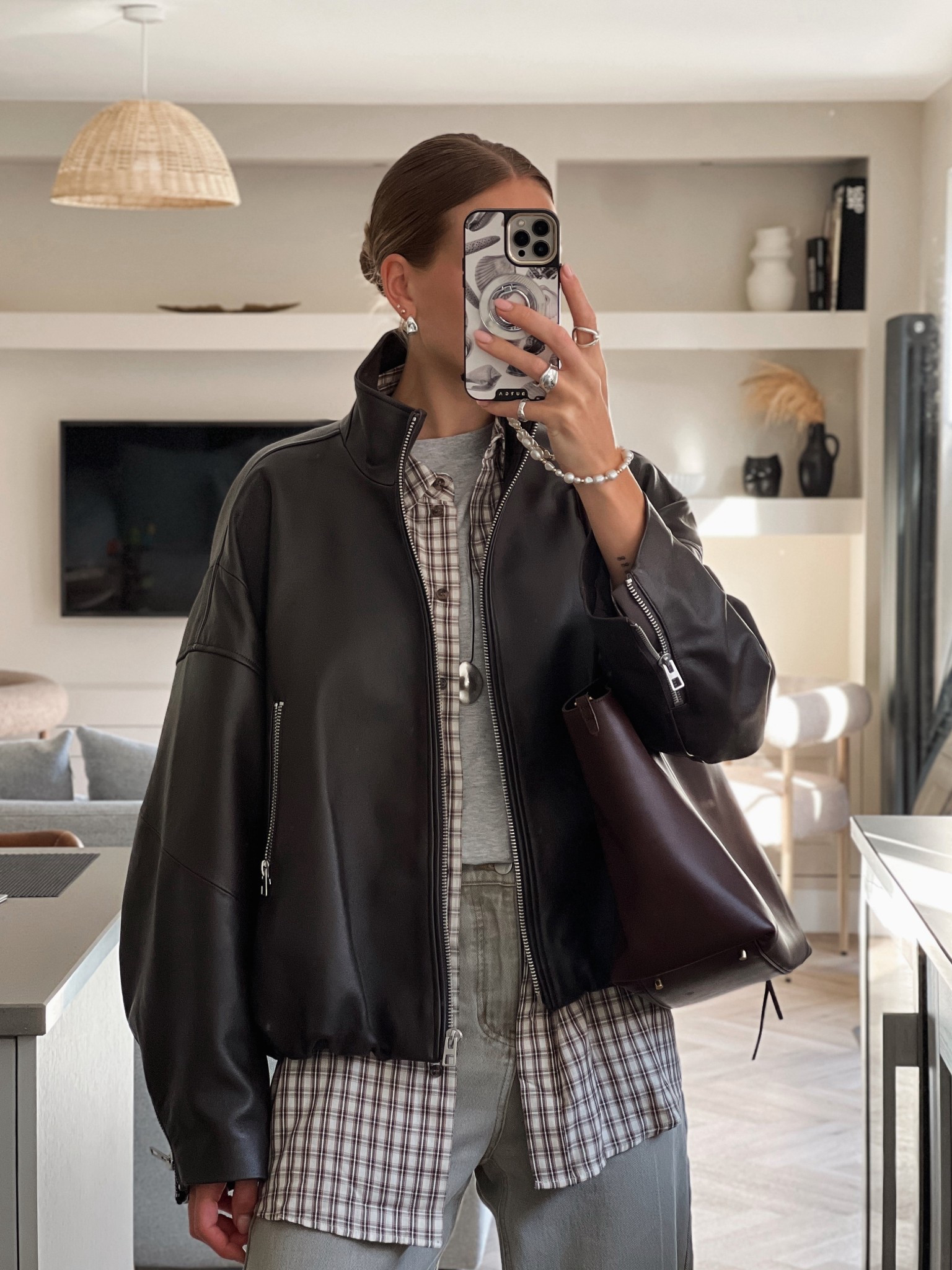 Autumn outfit Uk - H&M new in checked shirt under £30! Great layering a plaid shirt  to add interest to go ur autumn outfits. 

The grey wide leg jeans and chocolate brown leather tote bag Fabrique code CHARLOTTE20 for a discount - 

Aviator bomber leather jacket last years H&M but I have found a few great alternatives! Autumn trends 2025 - fall fashion trends 

#LTKstyletip #LTKuk #LTKautumn