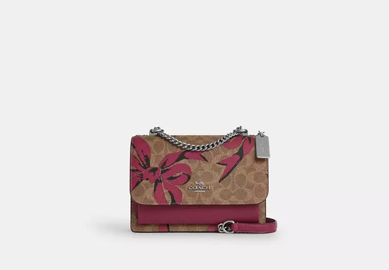 Coach Outlet Klare Crossbody Bag In Signature Canvas With Bow Print - Pink | Coach Outlet US