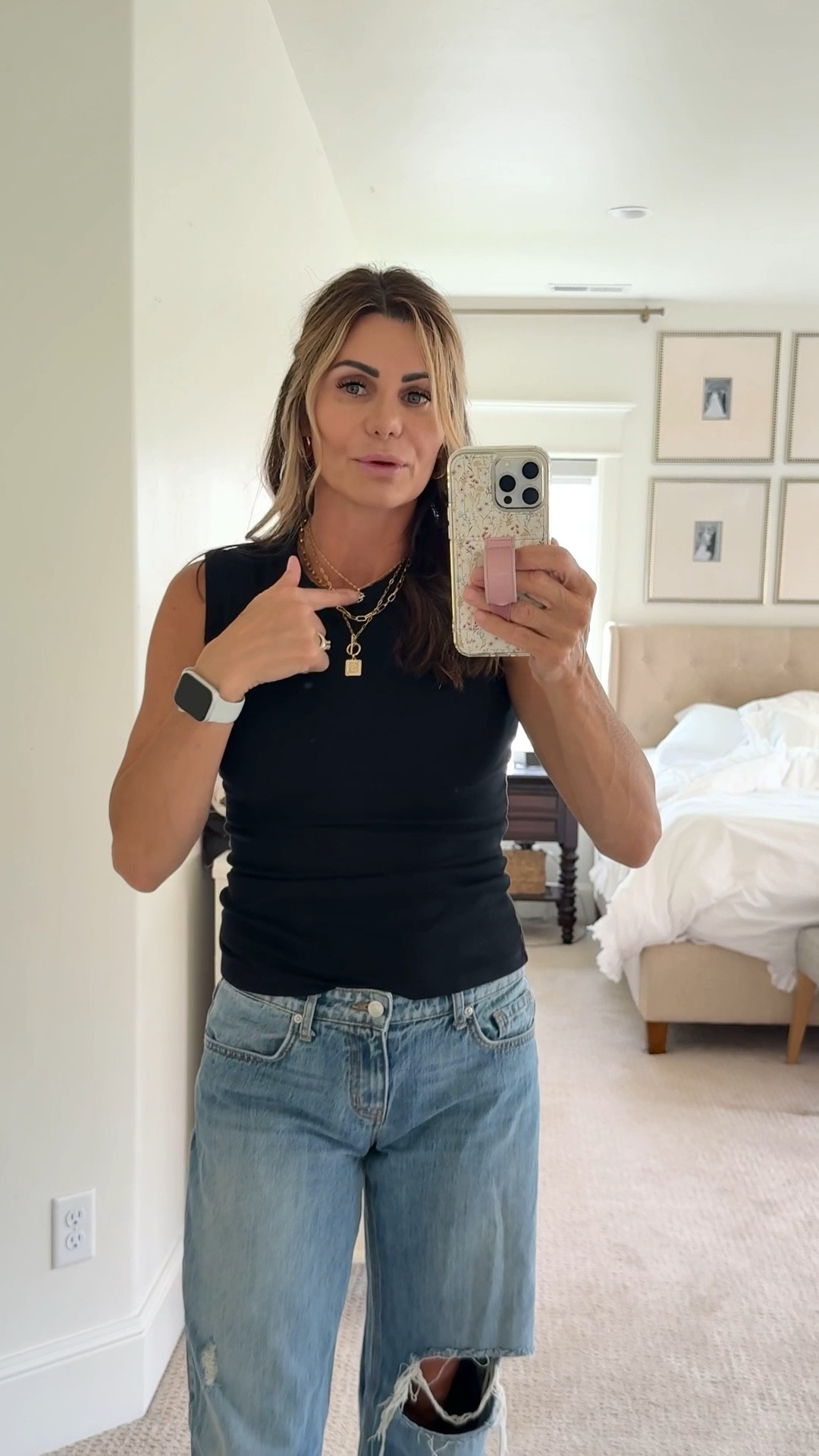 Jeans 
low-rise, baggy fit that has everyone talking. This 5-pocket jean is the perfect basic, combining comfort and style. Our TLC is now in Mixed Emotion— A medium wash mixed with hand sanding and potassium to create the perfect, worn vintage look

Adidas Shoes
These adidas Sambae shoes breathe new life into a classic. Long gone are the days of the Samba as just an indoor training shoe — this fresh take on a timeless silhouette ushers in a new era of effortless versatility. A slightly more elevated gum rubber outsole and reworked upper add a modernized perspective that pairs perfectly with both casual and dressed-up looks.

Tank top 
Ribbed muscle tank top in solid color Midweight blend of cotton, modal and spandex Crew neckline Regular fit
Long length

Necklace 
14K Gold Plated Simple Moon Choker Square Letter Pendant Necklace, Paperclip Chain Necklace,
