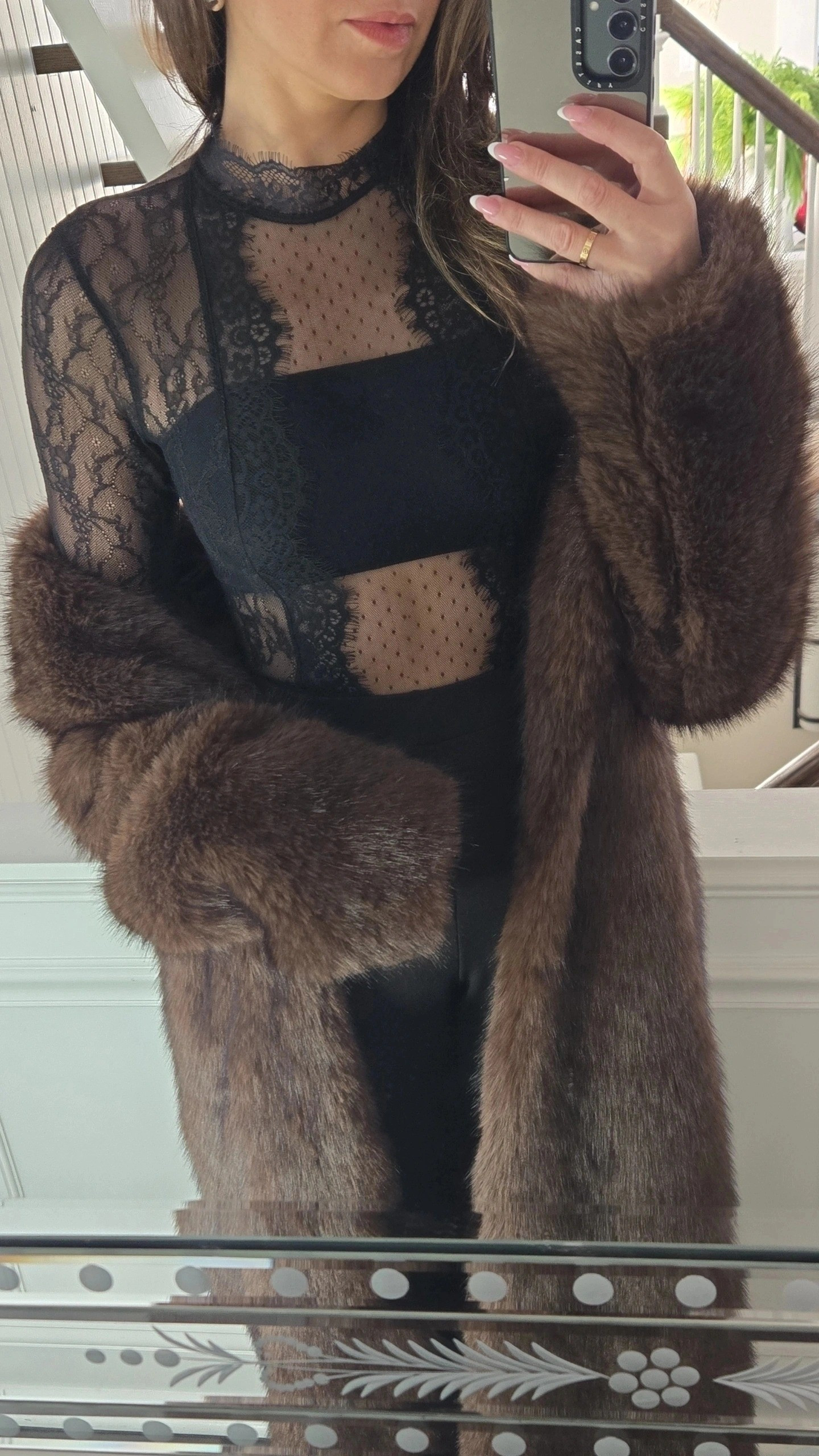 My coat runs big so I sized down to a small. I get SO many compliments when I wear this. It is very warm and great quality. My romper is old and not available anymore. Brown, faux fur, long, holiday, winter.

#LTKHoliday #LTKWedding #LTKTall