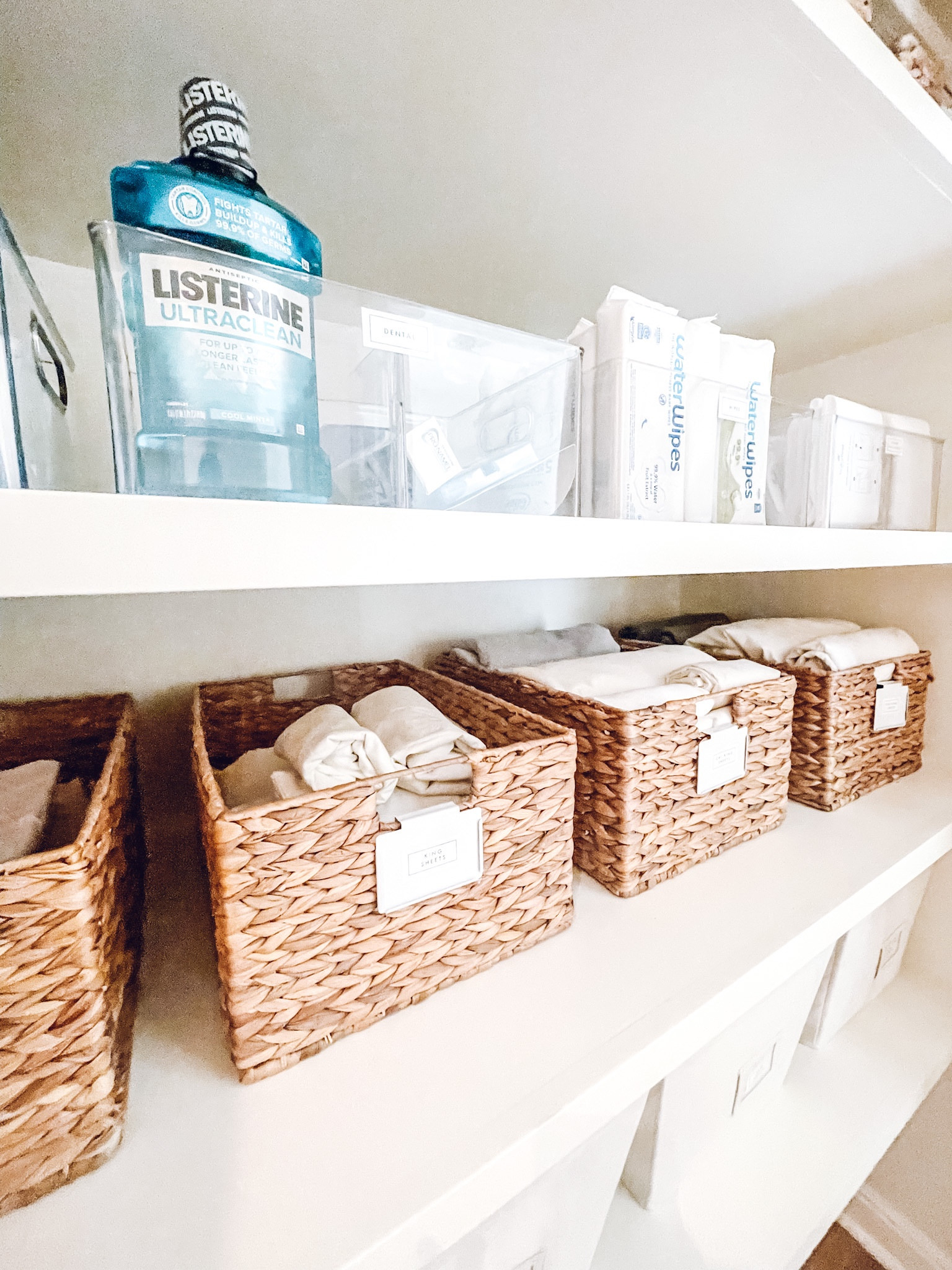 Linen closet organization✨The Home Edit Divided All-Purpose Bin. The Container Store Bin Clips. The Container Store Water Hyacinth Bin. Amazon Brother P-Touch Label Maker. Amazon Listerine Mouthwash. 

#LTKfamily #LTKhome #LTKkids