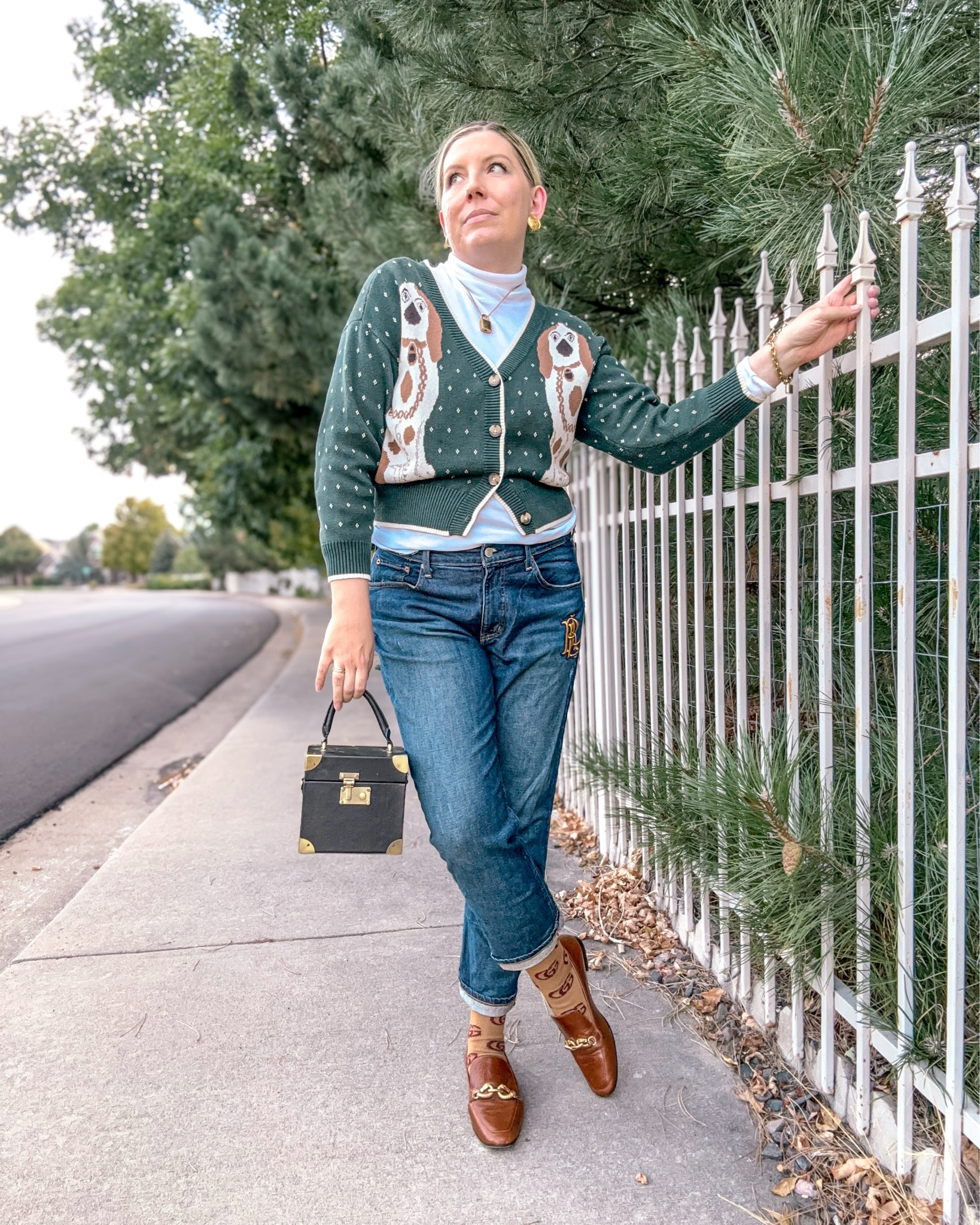 Look 5 - Heritage Hall 🐎 
A curated style series

I’ve been waiting for the perfect moment to break out these socks, and this outfit seemed like just the occasion. 🧦 I love the pop of pattern and how they add something unexpected to the look I’ve always been a big sock person, and while I love a classic ankle sock (classic millennial amiright?) I’m so excited to see more playful options making a comeback. Styling socks with loafers has me thinking back to my 12-year-old self… turns out she really knew what she was doing. 😄

For this outfit, the jeans were super comfy, but next time I’d love to try it with a more classic trouser - same shape, just a slightly elevated material. Either way, the look is comfy, fun, and perfect for fall.

This is part of Heritage Hall, my current capsule - a curated two-week wardrobe blending classic prep with whimsical, autumnal touches. Each capsule is built around a mood or theme, making everyday dressing intentional and joyful. 🍂 

Cardigan - Rachel Antonoff (rental and 2nd hand options linked)
Jeans - Lauren Ralph Lauren
Turtleneck - Polo Ralph Lauren (similar linked)
Earrings - Vintage Givenchy (linked)
Necklace - Louis Vuitton lock on chain (similar linked)
Bracelet - Michael Kors
Bag - Dillards (linked - 2nd hand)
Socks - Gucci
Loafers - Tory Burch

#LTKSeasonal #LTKStyleTip #LTKItBag