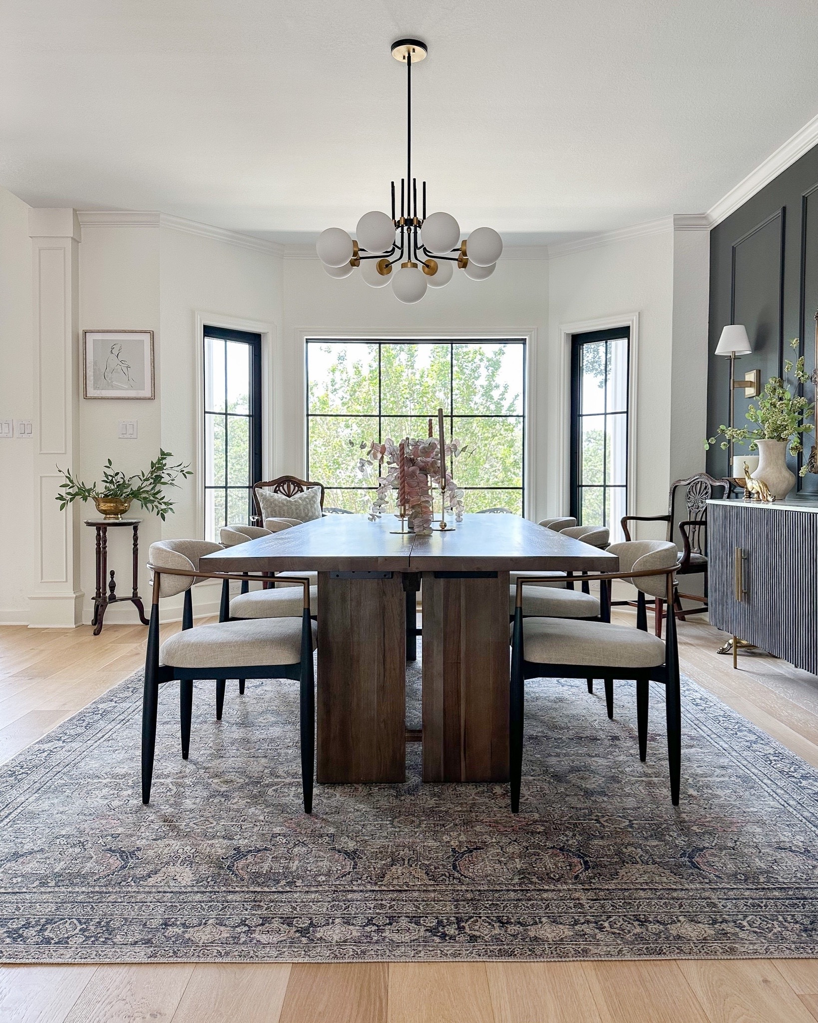 Dining room views — Crate & Barrel wood dining table, Arhaus jagger chairs, Arhaus dupe dining chairs, Loloi Layla rug, modern black and gold chandelier, buffet, dining table decor

#LTKhome #LTKstyletip #LTKfamily
