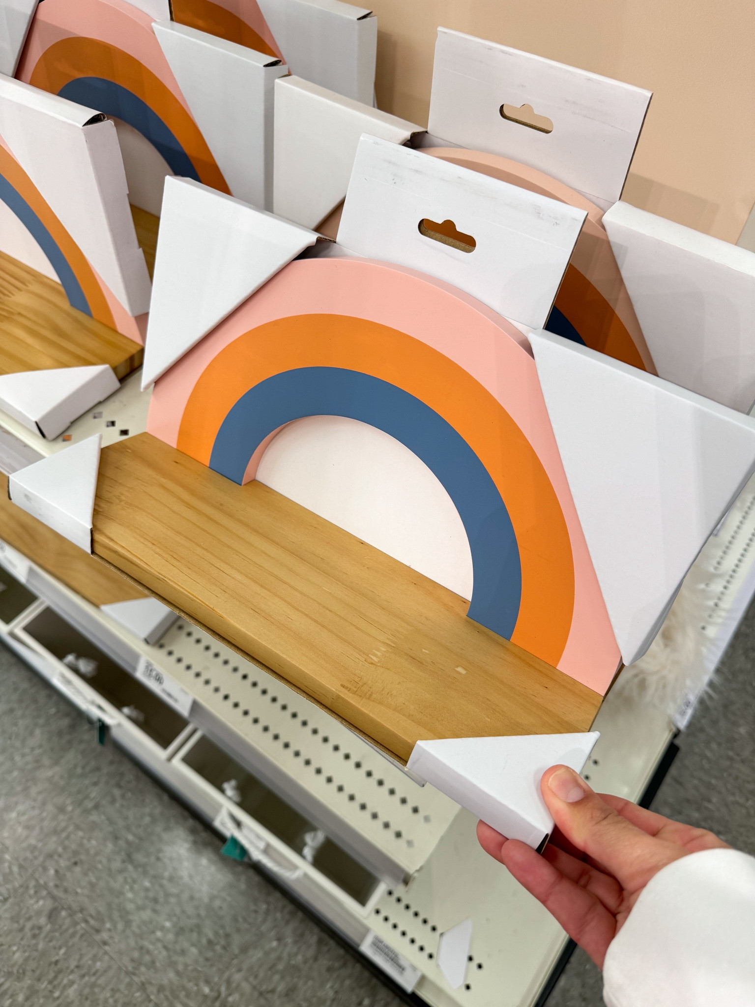 From the target app:

This Rainbow Shelf from Pillowfort™ is a stylish wall accent that helps keep your kid’s room organized. Designed with a painted rainbow backer and natural wood base, this semicircle-shape wall shelf is both charming and versatile. A great addition to any playroom or bedroom, it features one shelf for displaying small decorations, photos, plants and more. Plus, it adds a touch of soft color to any wall.

#LTKkids #LTKhome #LTKfindsunder50