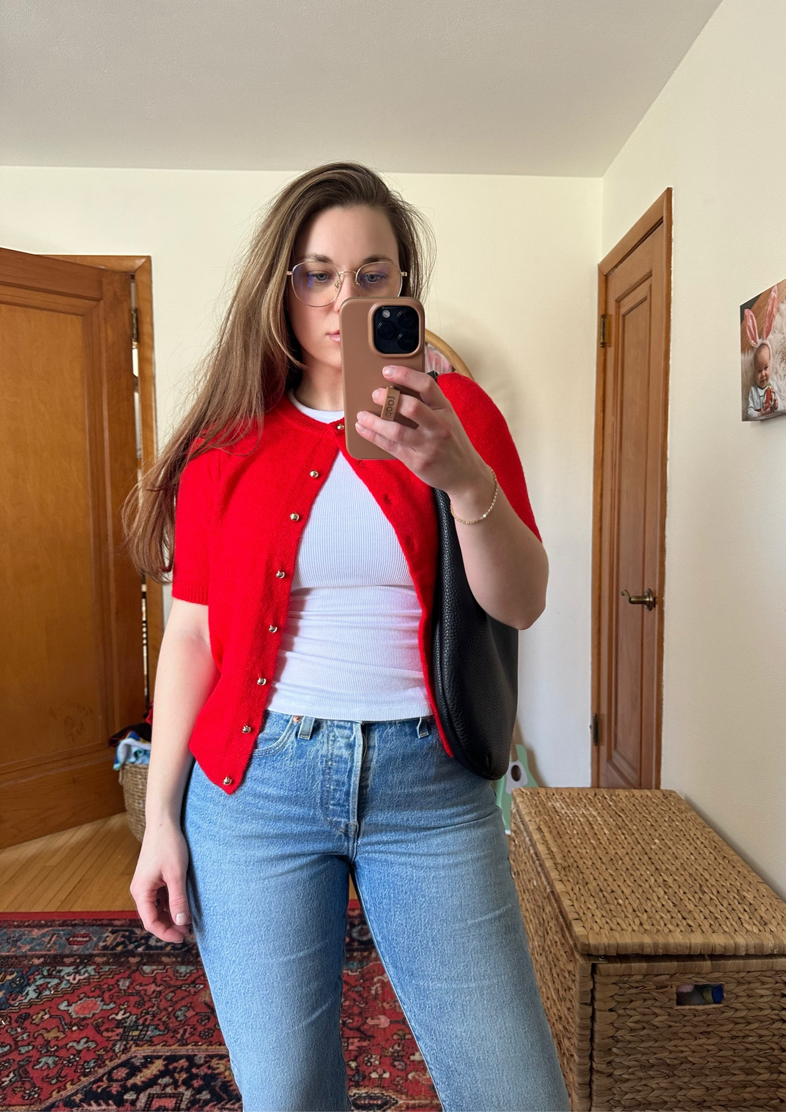 Spring outfit 
H&M red cardigan sweater S 
Nuuds white slinky rib tee S 
Levi’s 501 jeans 27 
Round Glasses 

#LTKSaleAlert #LTKWorkwear #LTKStyleTip