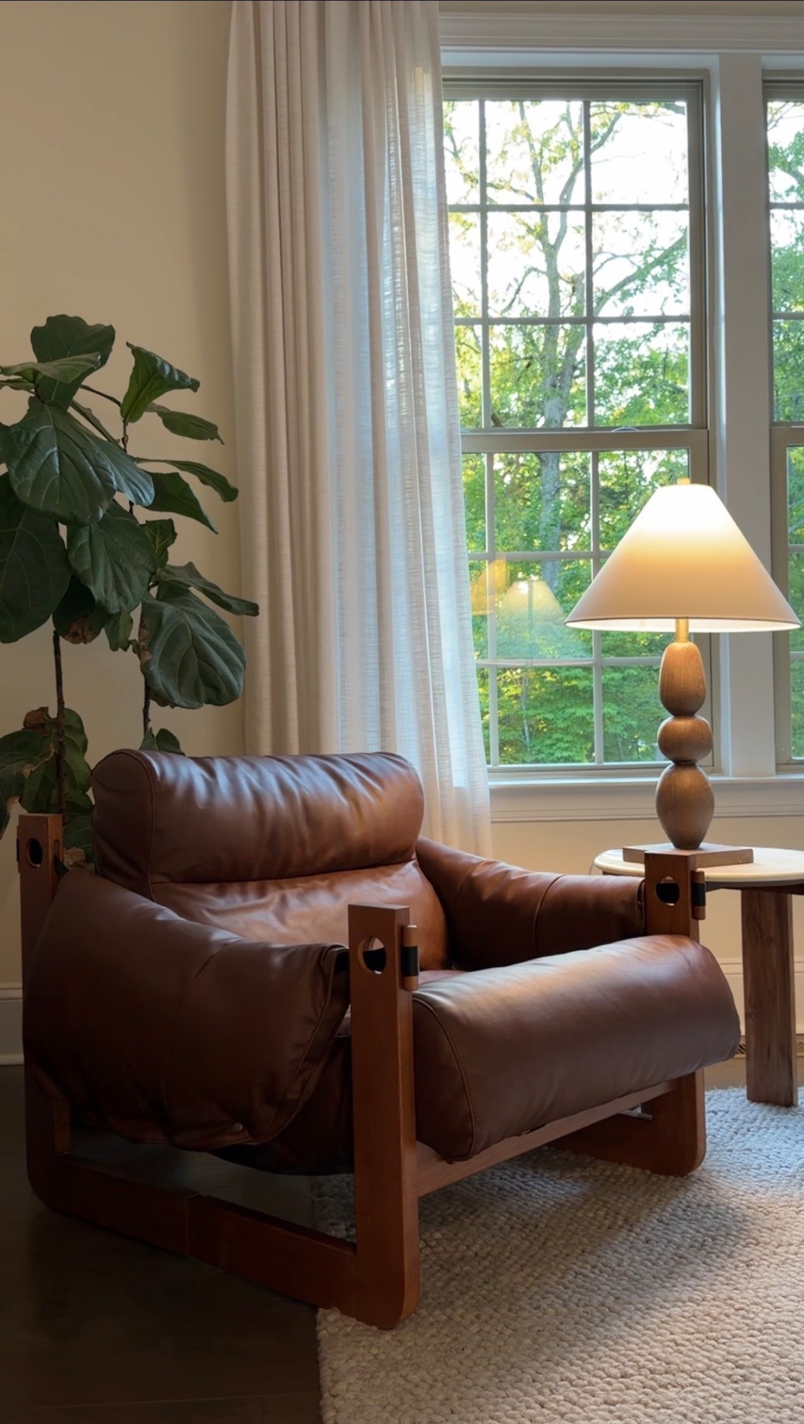 Retro brown, leather chair, table lamp @Wayfair @twopagescurtains 