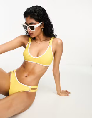 River Island textured high leg bikini bottom with button detail in yellow | ASOS (Global)