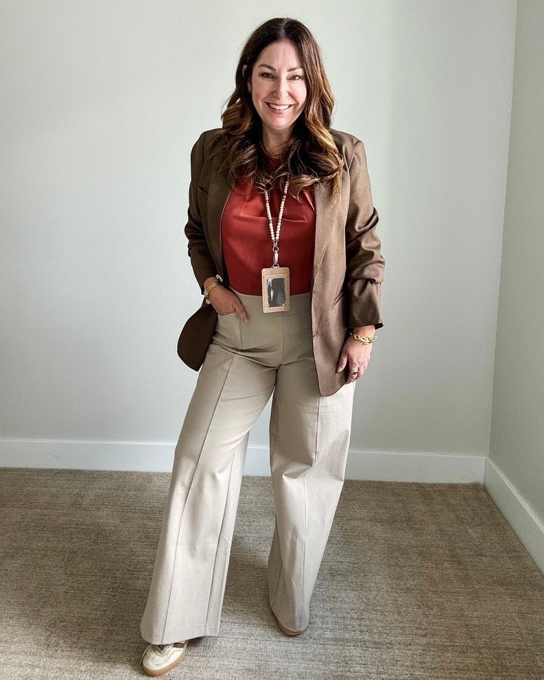 This brown oversized blazer paired with a rust color silky blouse and wide leg pants with a stretchy waistband and fall neutral sneakers 

 #businesscasual #fallworkwear #teacheroutfit #LTKMidsize #LTKFindsUnder50 #LTKWorkwear

#LTKSeasonal #LTKMidsize #LTKWorkwear