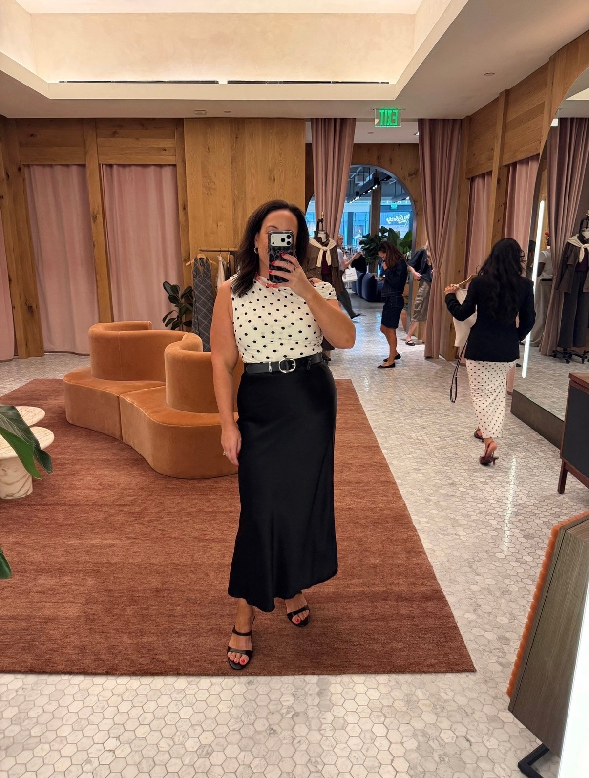 This black maxi skirt and polka dot top from Aritzia make the cutest outfit for a day out. We love how the polka dots add a fun touch to the classic black skirt.

#LTKSeasonal #LTKMidsize #LTKootd