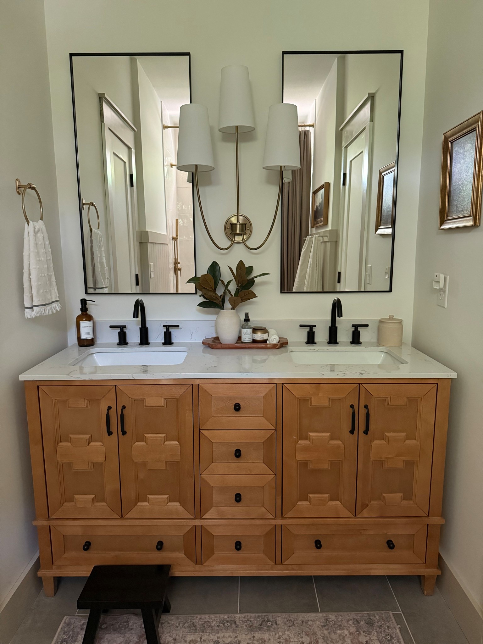 Double sink vanity. Vanity. Bathroom mirrors. Brass sconce. Black bathroom faucet. Neutral decor  

#LTKHome