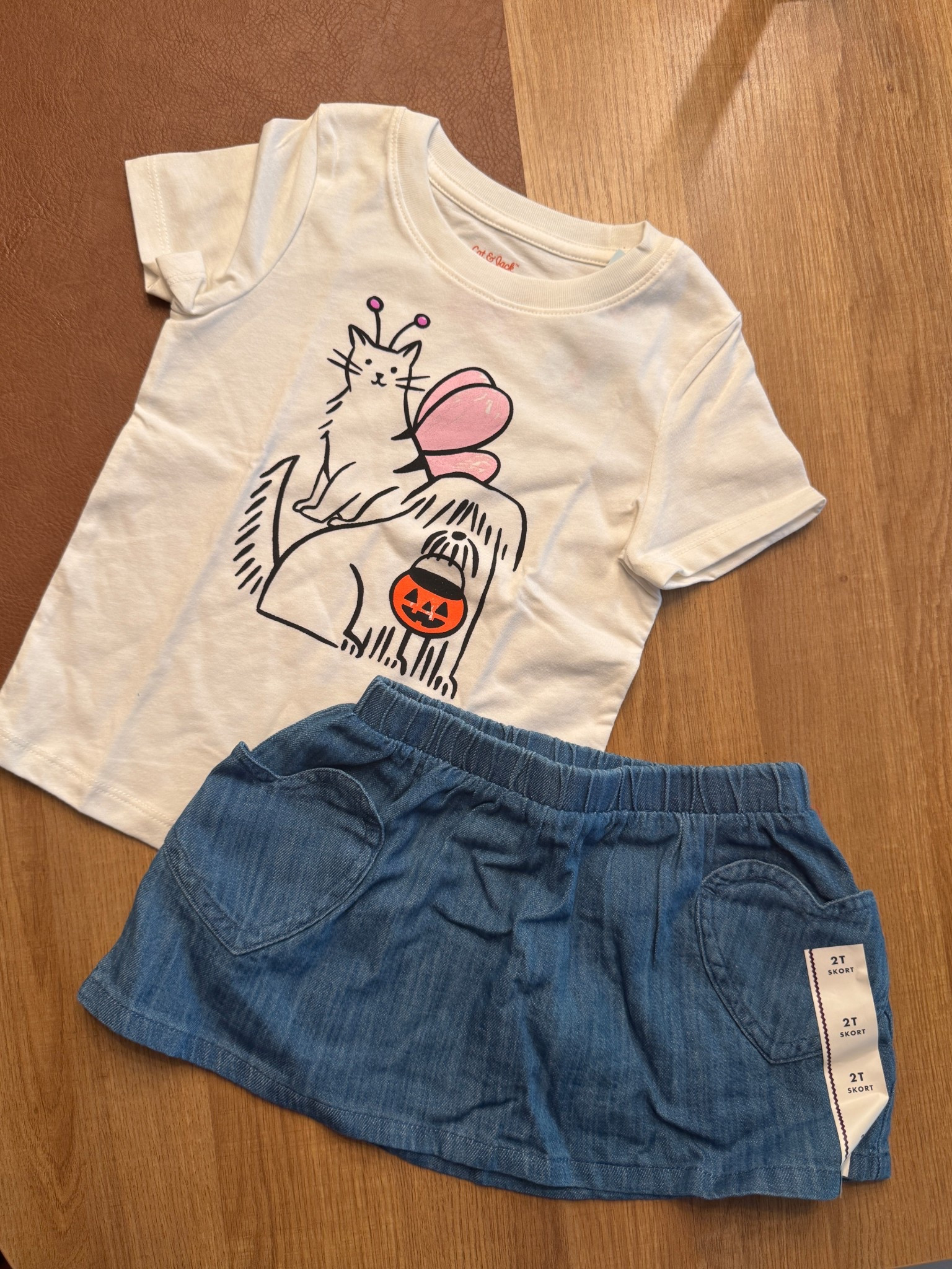 Toddler girls Halloween graphic tee and denim skort 

#LTKKids #LTKStyleTip #LTKSeasonal