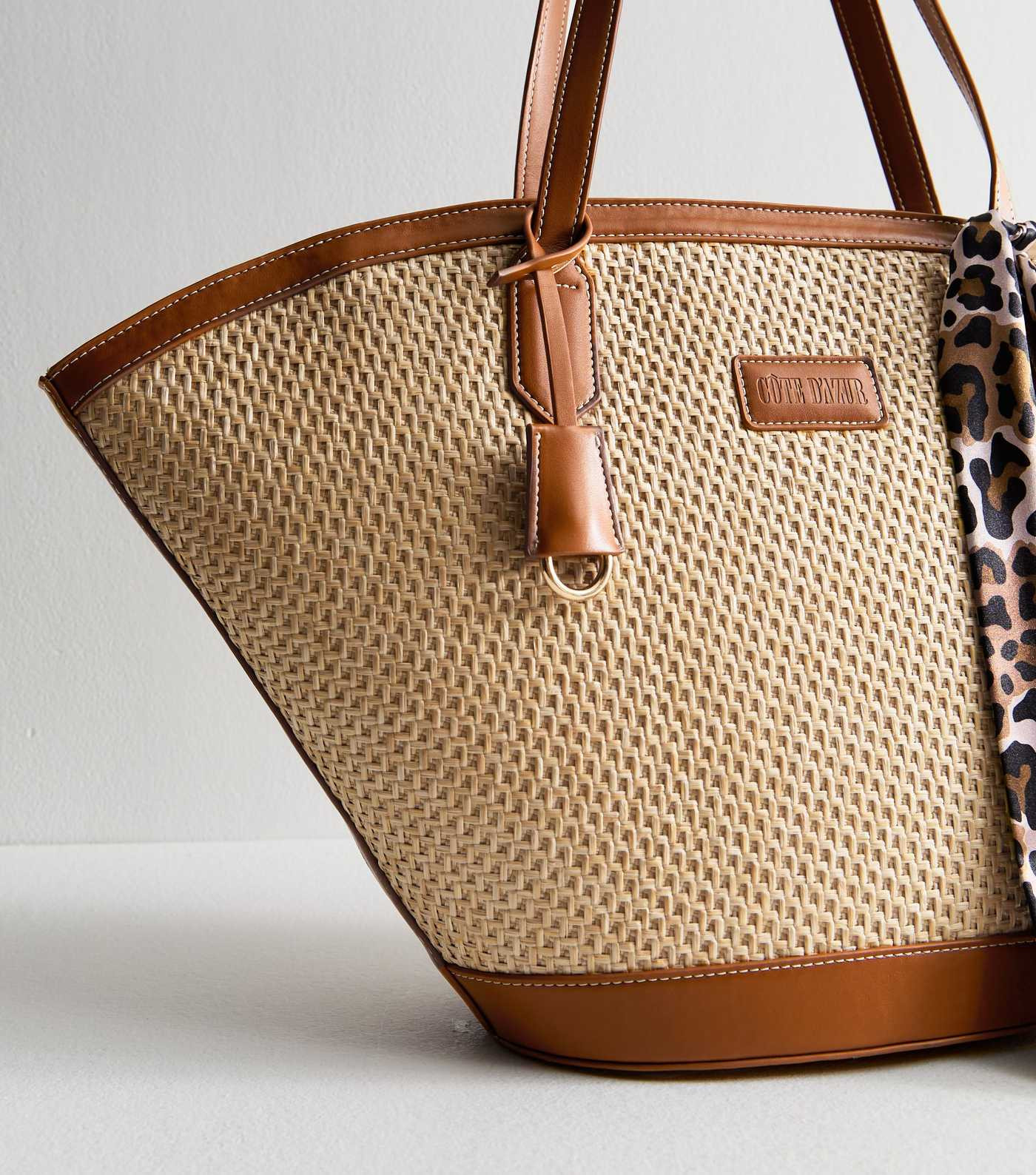 Stone Faux Leather Trimmed Raffia Look Tote Bag
						
						Add to Saved Items
						Remove from... | New Look (UK)