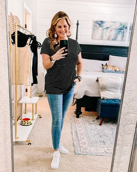 When you wanna be cute, but not for the sake of comfort. Fun sneakers and cute jewelry can spice up even a basic T-shirt. Love this slouchy striped tee. Super forgiving. Wearing size XL

#LTKbeauty #LTKunder50
