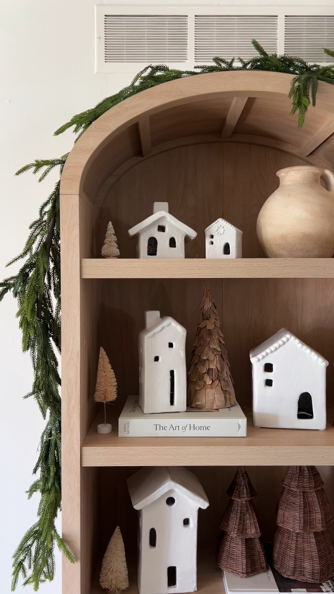 Christmas village display in my arched cabinet 

#LTKSeasonal #LTKHome #LTKHoliday