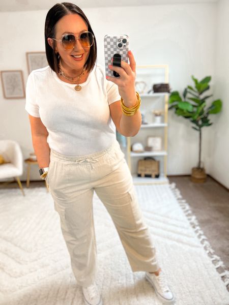 New linen cargo pants. Just under $20!  Fit tts. Large in mine. XL ribbed tee. Sneakers run big. Size down  

#LTKmidsize #LTKfindsunder50 #LTKover40