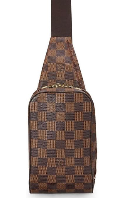 
Louis Vuitton

Pre owned 

Coated Canvas
Imported
Pre-Loved Condition: Very Good; Light tarnishing and scratching throughout hardware, moderate scuffing and wear to edges
Length: 4.5" (11 cm), Height: 7.5" (19 cm), Depth: 2" (5 cm)
Made in Spain
Adjustable Canvas Strap