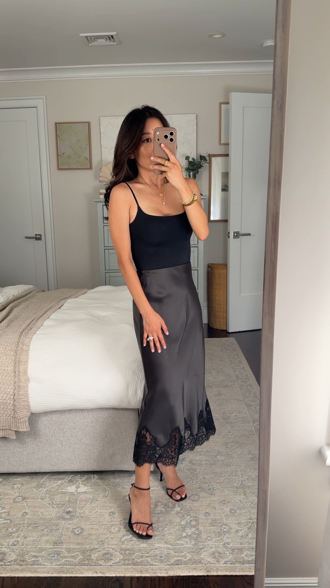 Size info below! Trying on Aritzia satin lace trim slip skirt XS in Flint Green (a charcoal gray green), I sized up for room at the tummy and hips 
• Cami XS (sized up) worn with nippies

Date night, girls night, summer 2026 outfit ideas, satin midi skirt, petite style

#LTKPetite #LTKootd #LTKmomlife