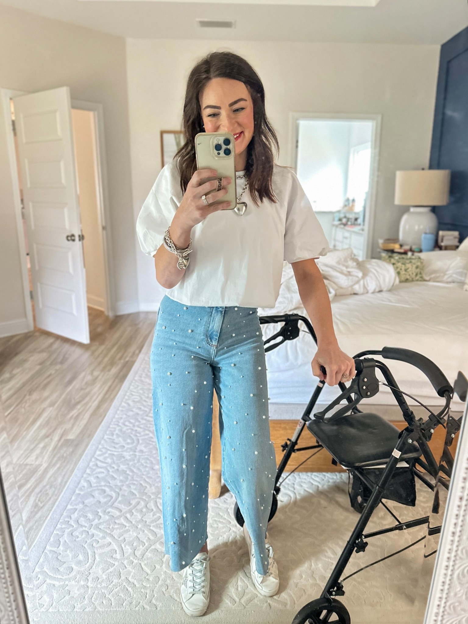 Loving these fun jeans! Dress up for date night or work, or dress down with sneakers! Also obsessed with this Anthropologie top, so flattering. Still loving all my puffy heart jewelry!

#LTKOver40 #LTKWorkwear #LTKPetite