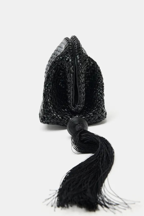 Woven pouch-style handbag with a patent finish. Tassel with metallic detail. Interior zip pocket.... | Zara US