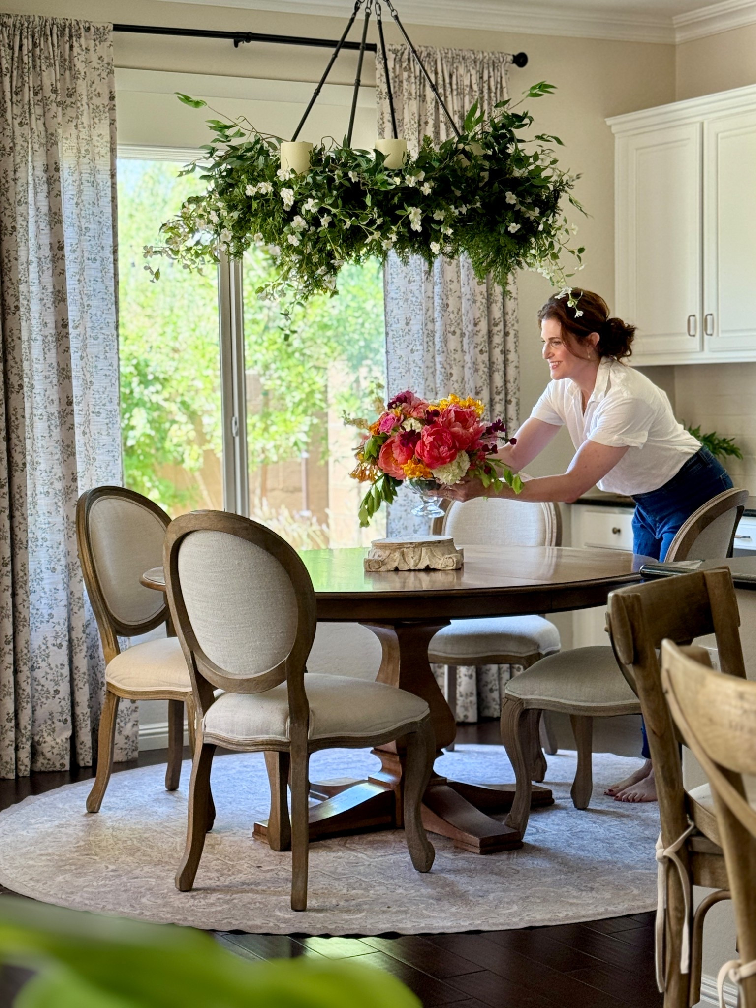 Chandelier 

This particular chandelier was purchased from Pottery Barn several years ago and is no longer available. But I have listed several current similar options below. These are all great options for adding garlands too (if you like to do that) 

chandelier, lighting, dining light, modern farmhouse light, wagon wheel light 

#LTKHome