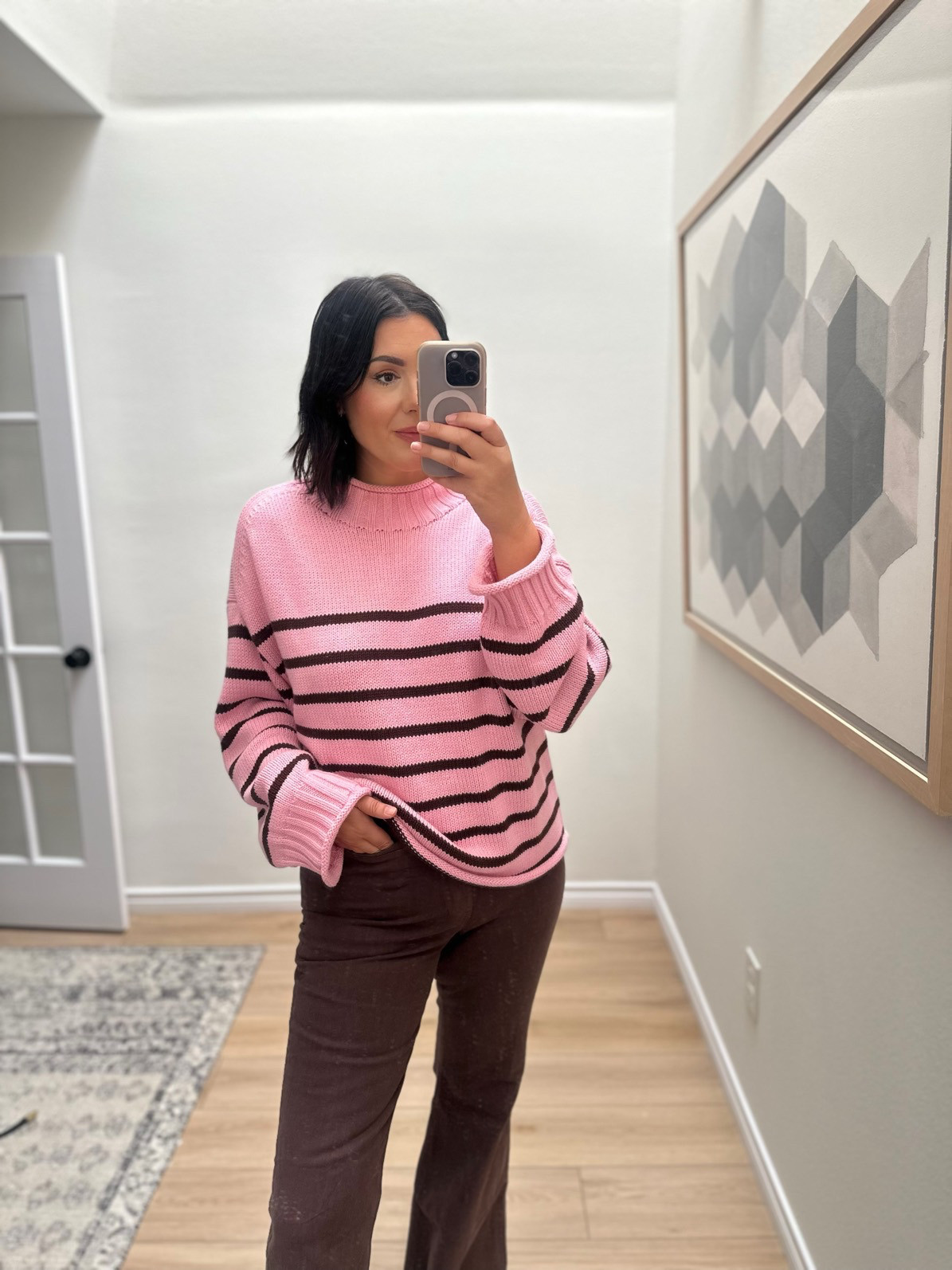 I wanted to give these a try because I’m loving this chocoalte brown for fall. These are a higher weight than denim, but stretchier than a chino. They’re a good mid-weight for fall. If you like the feel of cords but don’t like to wear cords, this is a nice alternative. 

I sized up to a 30 and this fits me perfectly. My body hasn’t changed since last fall when I was in a 29, but this fall I’m in a 30. Seems to me that in J.Crew and Madewell I’m one size up in pants. I find this to be across the board for these brands, just FYI. 

This is their Rollneck Sweater and while it’s not on promo, it’s such a nice essential for winter. It’s not sweater weather at all but when it is...I’ll be ready. 

This colorway is sold out but there are a bajillion of other colors / stripes / etc. I’m in the medium and it's a big oversized fit.  

 