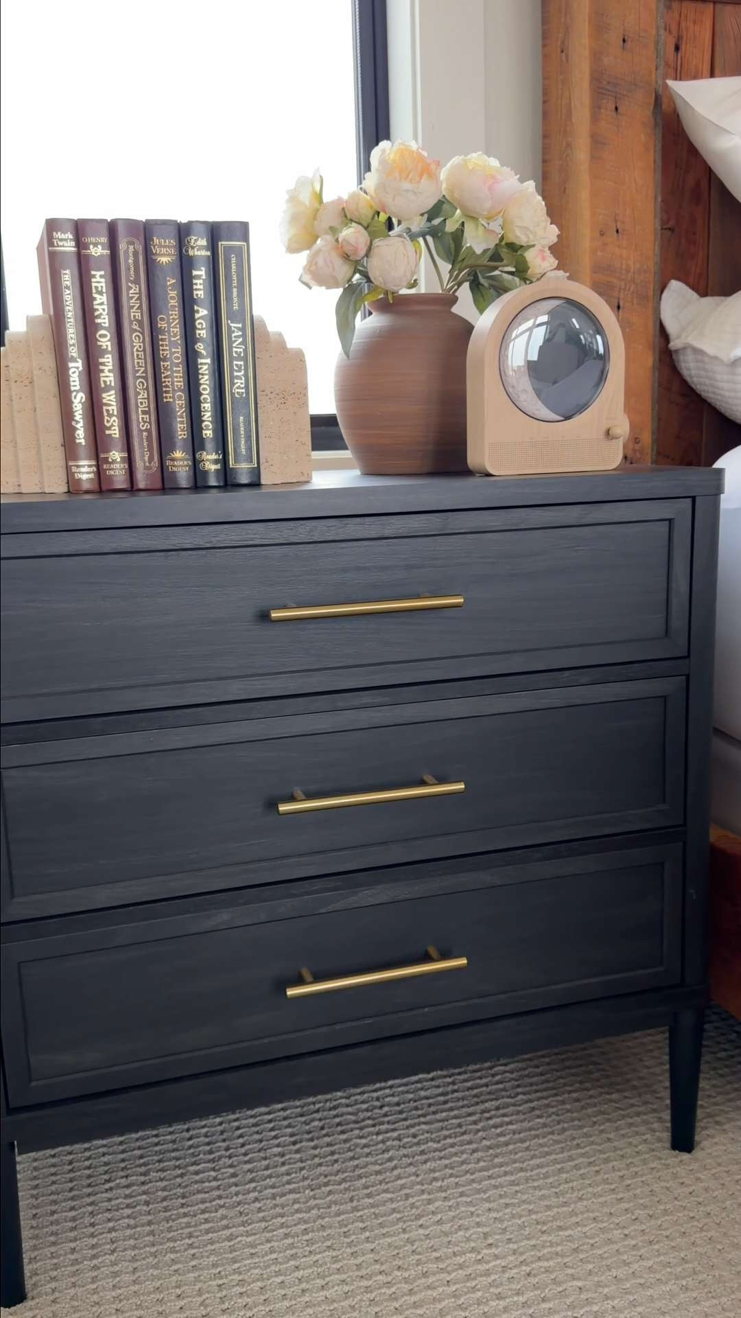 A black nightstand is one of my favorite ways to add contrast to a room. It grounds the space, makes everything around it feel a little more elevated, and somehow always makes the styling on top look better.

Such a good piece if your room needs a little depth. 

 #LTKmomlife #LTKvlog #LTKHome