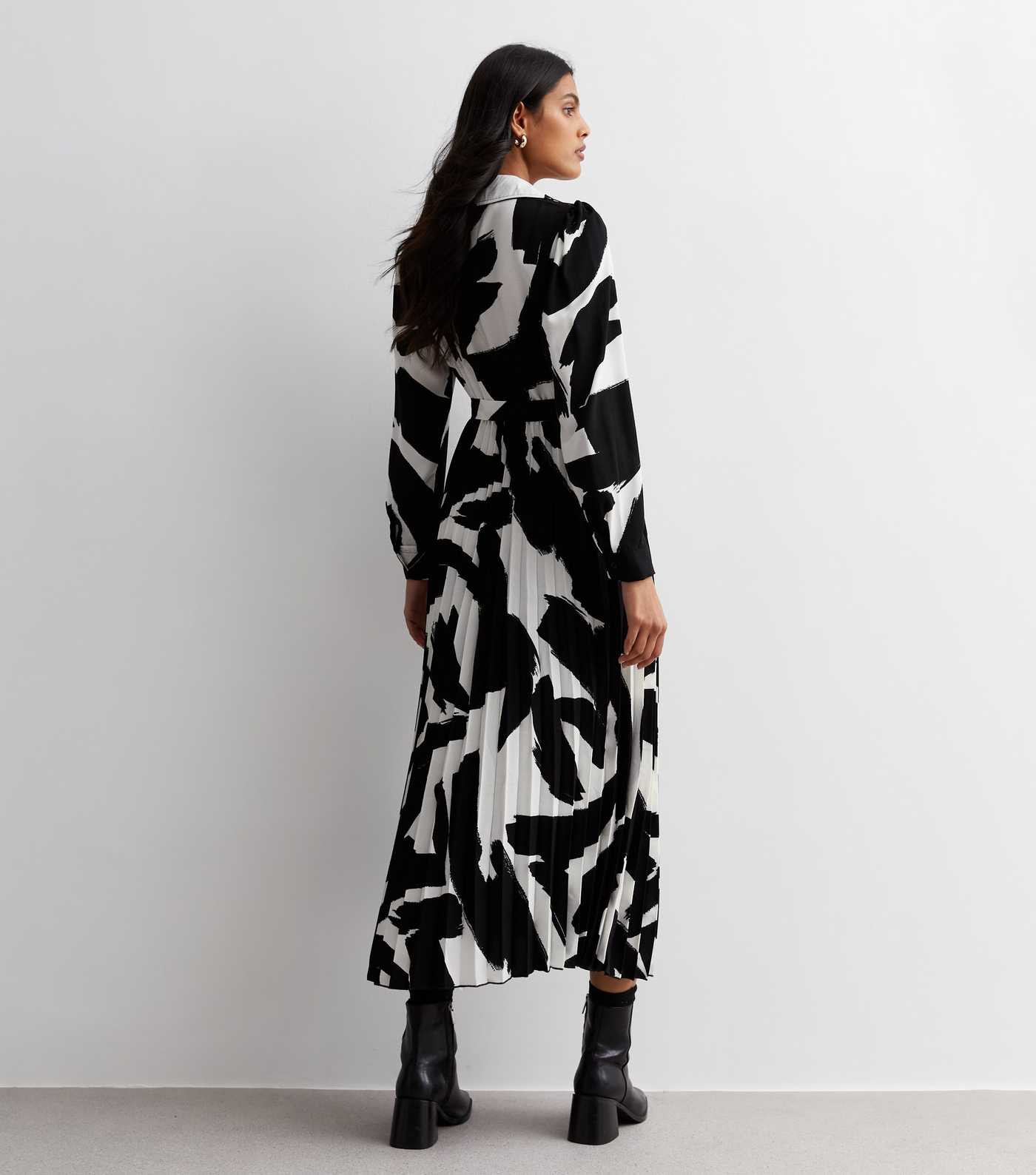 Black Abstract Pleated Wrap Midaxi Dress
						
						Add to Saved Items
						Remove from Saved ... | New Look (UK)