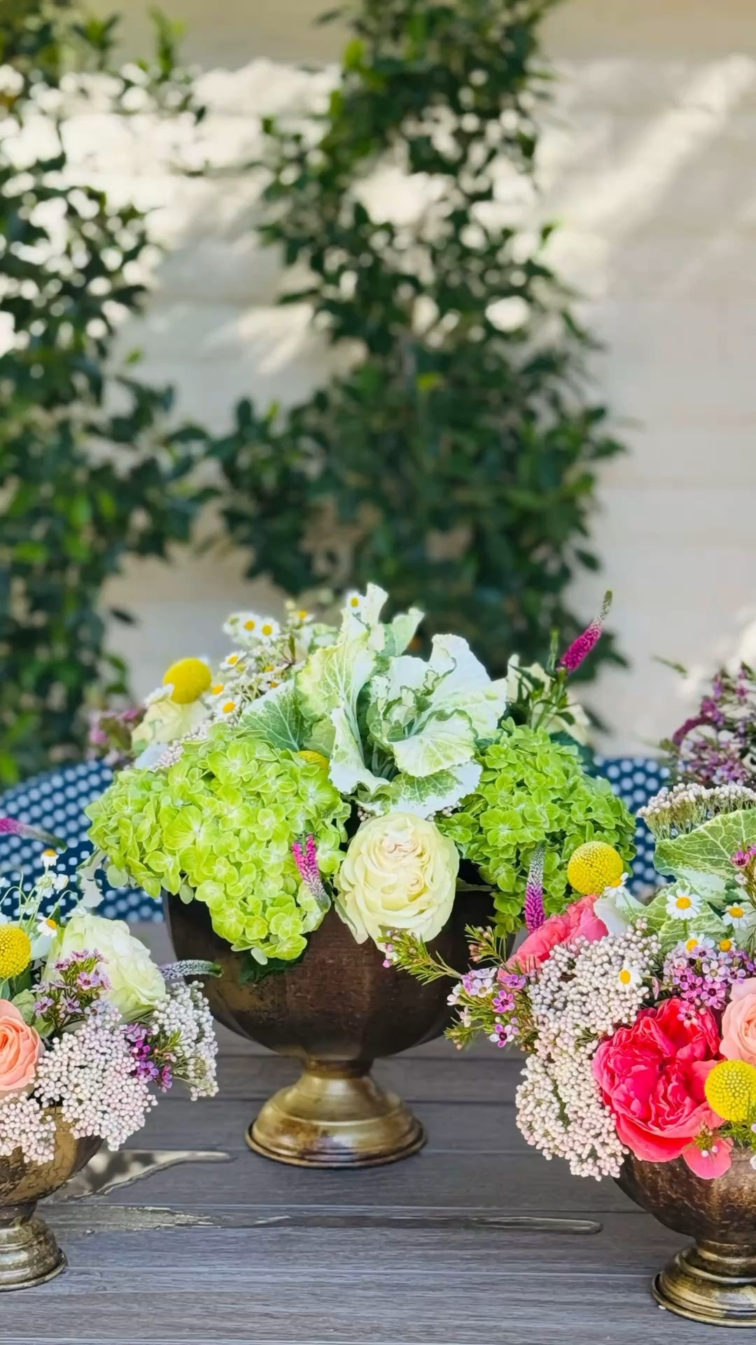 I love these antiqued gold vases that come in a set of three from terrain. It makes flower arranging so easy! 

#LTKParties #LTKHome