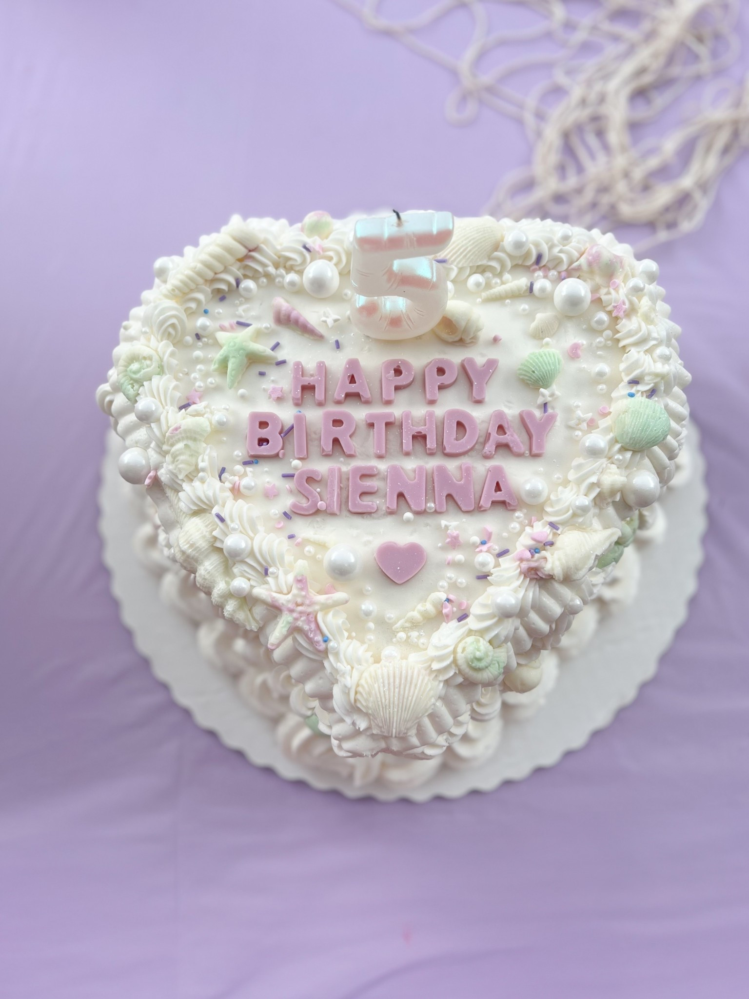 $25 Walmart cake glow up: Little Mermaid style! Just add chocolate molds and edible glitter! ✨🫧🪸

#LTKFamily #LTKKids #LTKParties