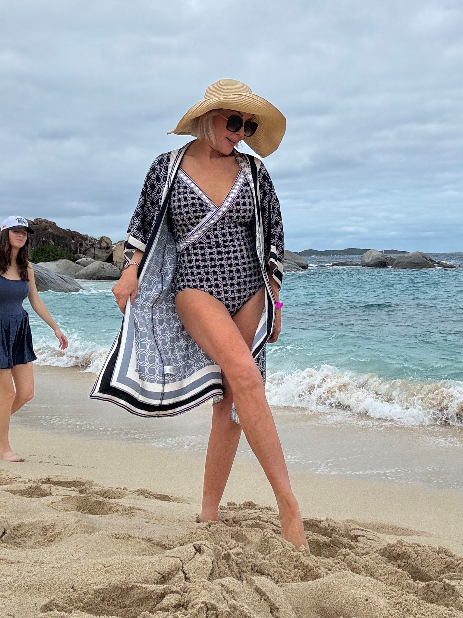 Gotten Golden Chic Kimono swimsuit coverup. They run small so the size 8 would fit a size 6 frame

#LTKSaleAlert #LTKSwim #LTKOver40