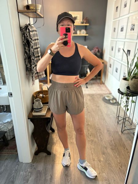 Target fitness and workout outfit! 🏃‍♀️ I’m about to head out for a run, and when I say these are the best affordable running shorts for $20, I MEAN IT.

In fact, I loved them so much I bought them in all three colours that they come in.  I rarely repeat buy, but for $20, these are an absolute steal.  In addition to the neutral taupe color, they also come in neon pink and black. 🎯

What I love most about them: they have zippered pockets, they are high-rise, they actually stay on when you run because they have a nice snug, full waistband, are SPF 50+, and have plenty of stretch to them.

P.S. My running hat is from Target too, and it’s also a really good buy for the quality 👌🏻

Absolutely love them. #target #targetfashion


#LTKmidsize #LTKstyletip #LTKfitness