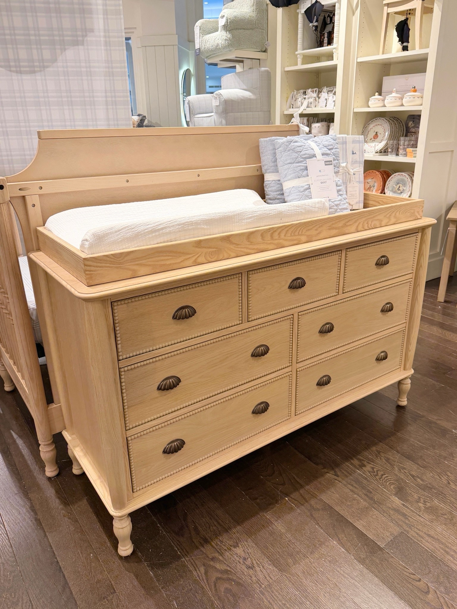 New at Pottery Barn Kids! 🐣 The Bria Hammel Extra-Wide Dresser & Topper Set is such a timeless nursery find with beautiful beaded detailing, turned legs, and charming shell-inspired hardware. 🫶🏻 I love that the removable topper transforms it from a changing station into a classic dresser that can grow with your child. 👶🏻 It currently comes in two beautiful finishes! I’ve linked more from the collection and similar nursery favorites in my LTK. 🍼 @potterybarnkids #nurseryinspo #dresser #nursery

#LTKHome #LTKBaby #LTKBump