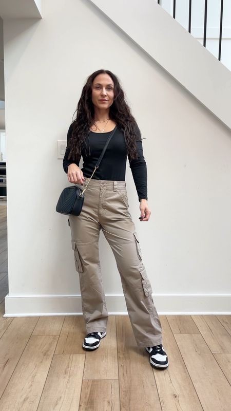 Cargos are perfect for easy fall outfits and these are SO GOOD!!! I love the length (I’m 5’4”). They’re perfect for wearing with sneakers. 

Everything else fits true to size as well. 
Fall fashion 
Nike dunks 
Nike sneakers
Slim fit top 
Long sleeve top 
cargo pants 

#LTKVideo #LTKstyletip #LTKfindsunder100