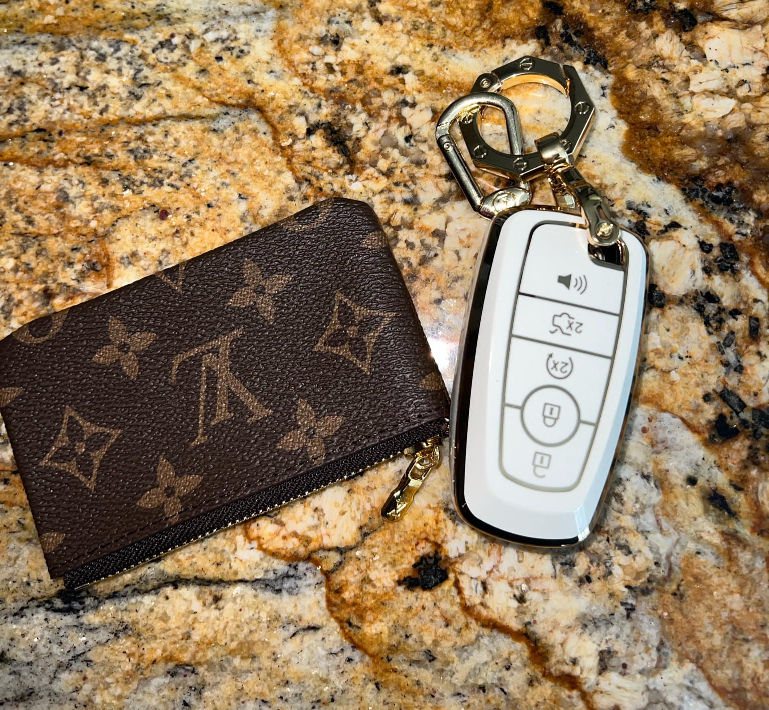 The cutest accessories for your car keys!! This key fob cover comes in so many colors for so many different models!! I also love this Louis Vuitton coin purse / keychain!!

#LTKhome #LTKunder50 #LTKstyletip