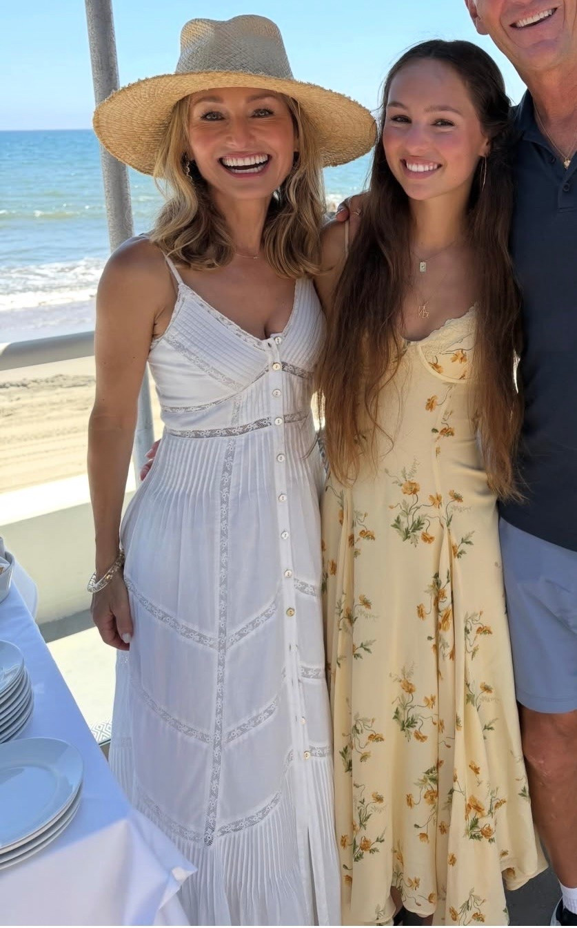 Giada De Laurentiis wears a white￼Esilda Lace Trim Cotton Dress