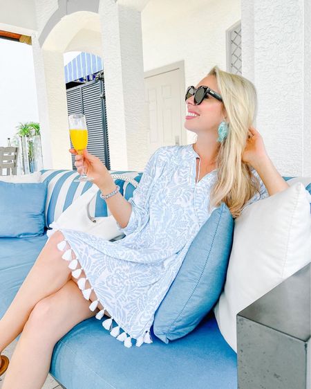 Cheers to the weekend! Loving this coverup from #tuckernuck and the prettiest fishy earrings from #annetchatoyer that are on sale! 

#LTKunder100 #LTKtravel #LTKsalealert