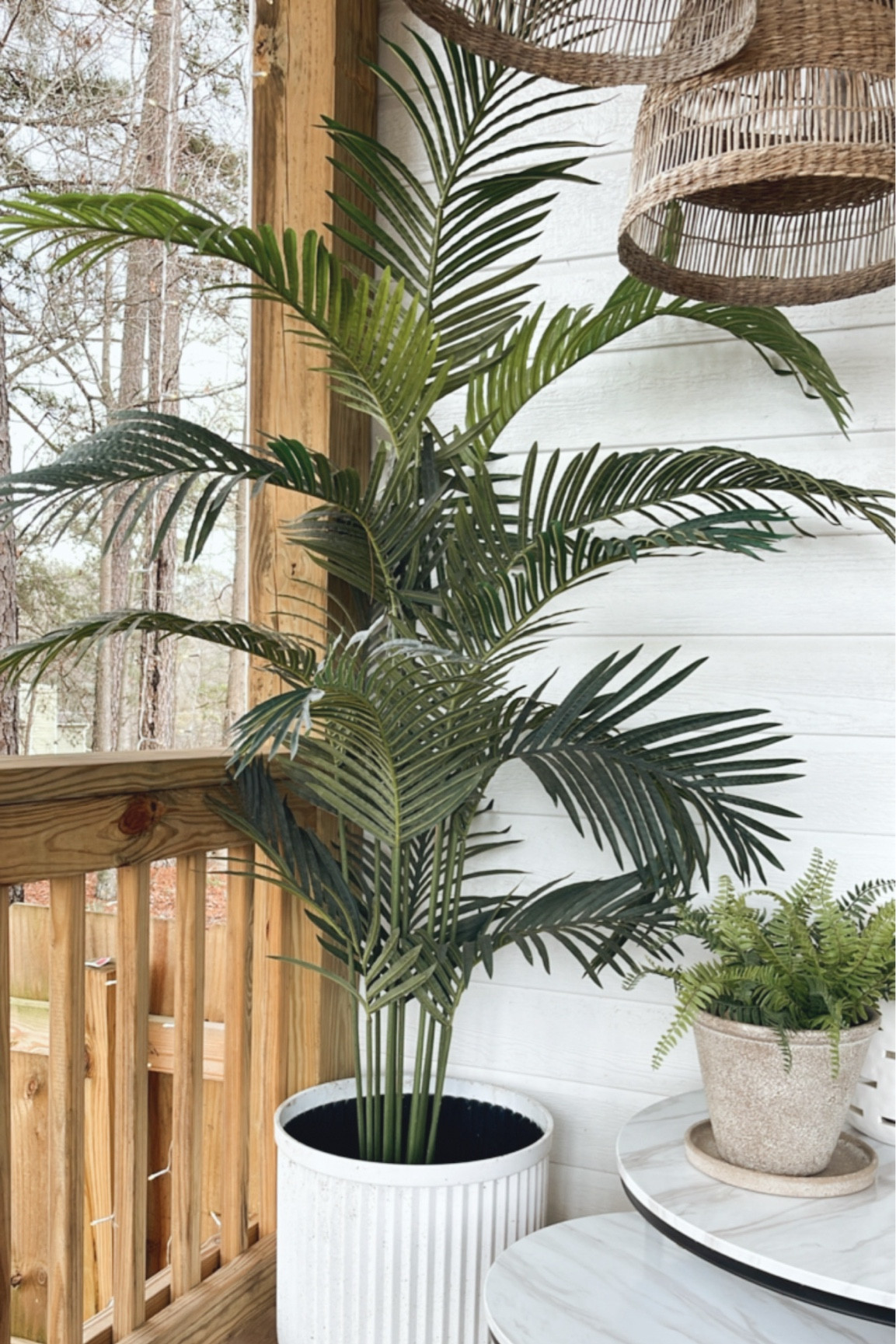 My faux palm trees and the fluted planter on my back deck. 

#LTKhome #LTKSeasonal #LTKfamily