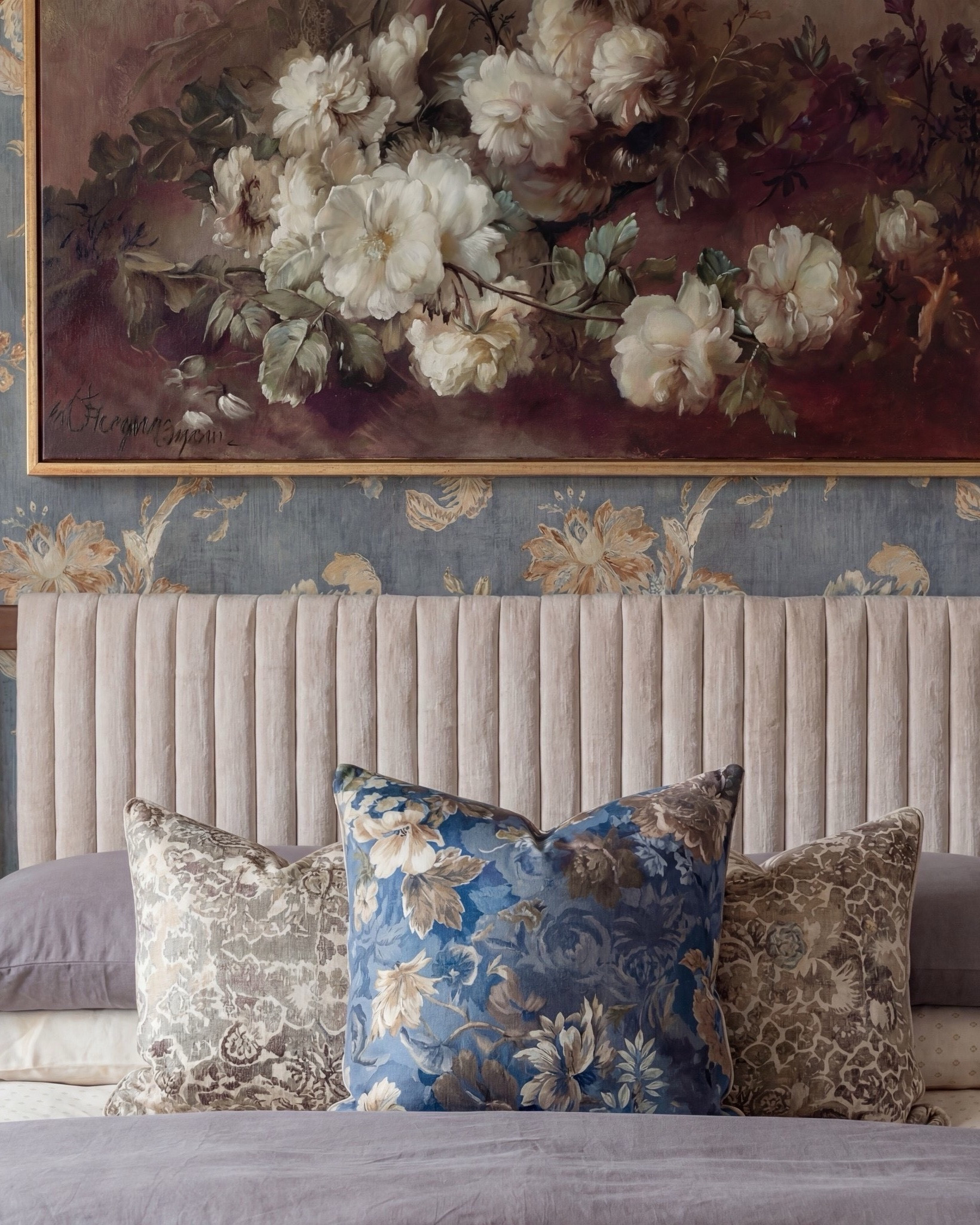 Shop the Look: Bedroom Refresh
• Warm-wood platform bed frame
• Vertical-channel upholstered headboard
• Gray duvet cover + layered sheet set
• Mixed blue + neutral accent pillows
• Oversized chunky knit throw blanket
• Shearling-style upholstered storage bench at the foot of the bed
• Pair of dark-wood campaign-style nightstands with brass hardware
• White drum-shade table lamps with blue glass bases
• Blue decorative bowls
• Bead garland décor
• Stack of books (nightstand styling)
• Framed oversized floral artwork above the bed
• Blue floral wallpaper (full wall + ceiling)
• Exposed wood ceiling beams
• Blue patterned area rug
• Window bench with plaid/tan accent pillows

#LTKSpringSale #LTKSaleAlert

#LTKsale #LTKhome