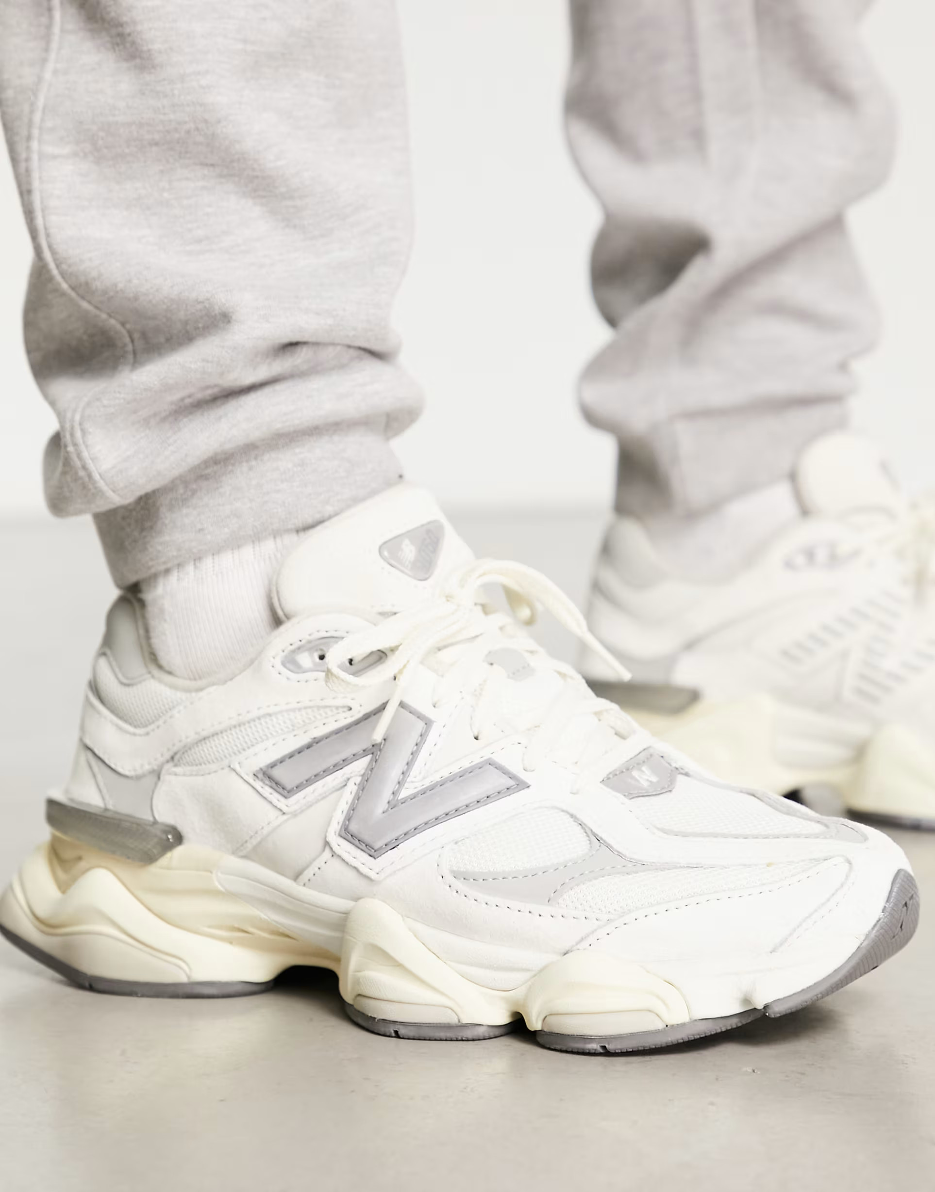 New Balance 9060 sneakers in white with gray metallic detail | ASOS (Global)