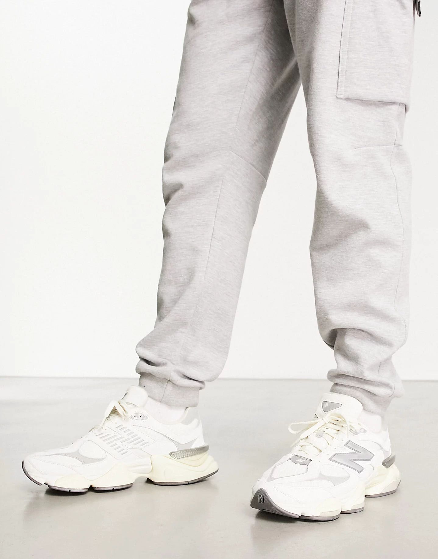 New Balance 9060 sneakers in white with gray metallic detail | ASOS (Global)