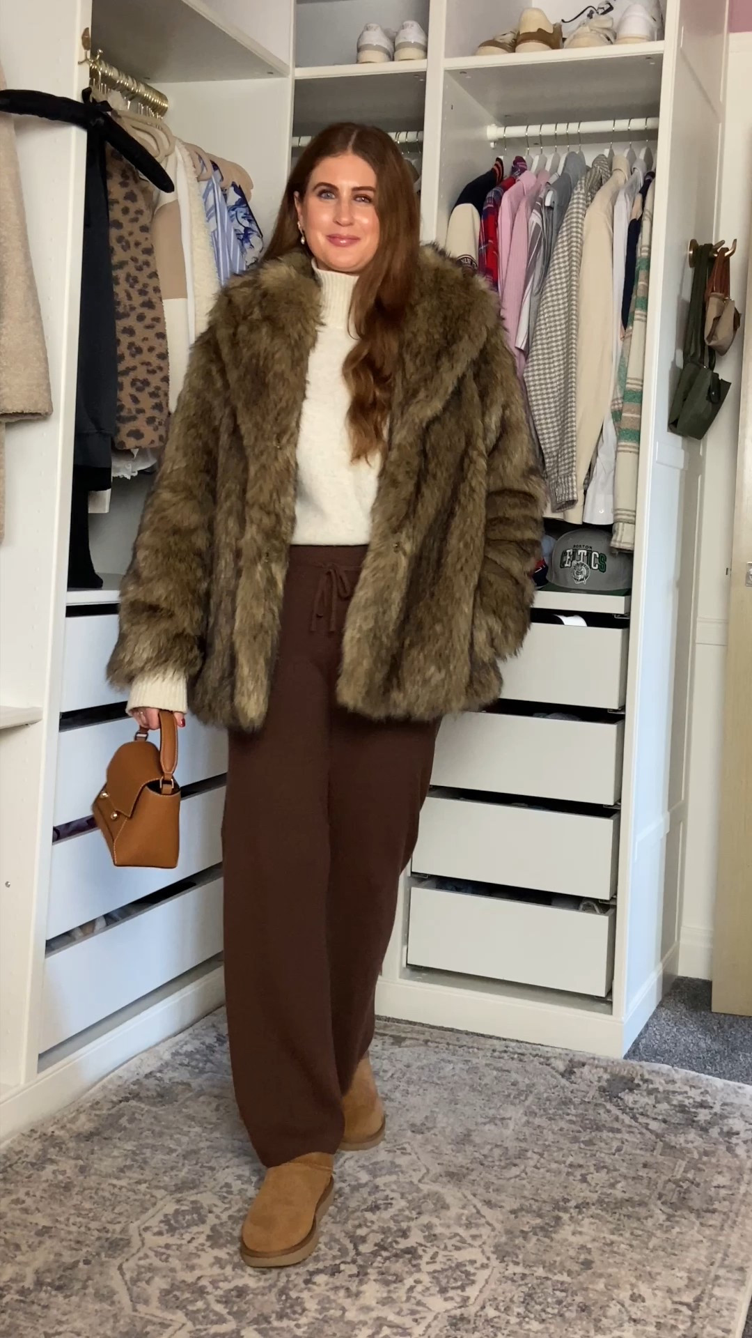 Faux Fur Coat Outfit Idea - Running Errands or Grabbing a Christmas Coffee 🛒☕️ Chocolate brown knitted trousers, cream turtleneck & mini ankle UGG boots, reamed with a tan bag. I’ve linked similar affordable styles so you can recreate that same polished, winter-luxe feel. Fur coat, fur jacket 

#LTKuk #LTKCyberWeek #LTKwinter