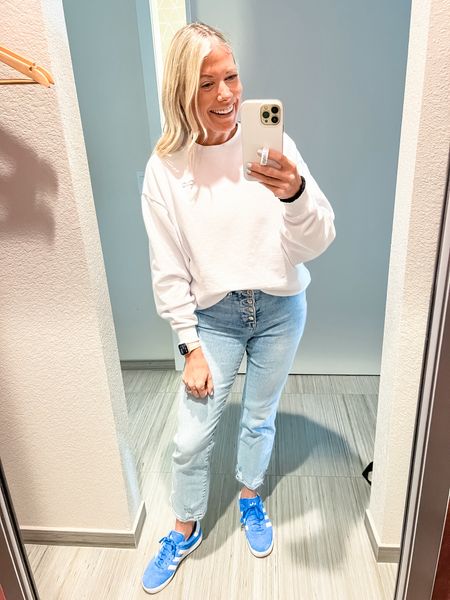 Love these blue gazelle sneakers with a white alo sweatshirt and straight leg jeans. XS sweatshirt, 26 jeans and 6 adidas (equal to a women’s 8)  

#LTKover40 #LTKstyletip #LTKSeasonal