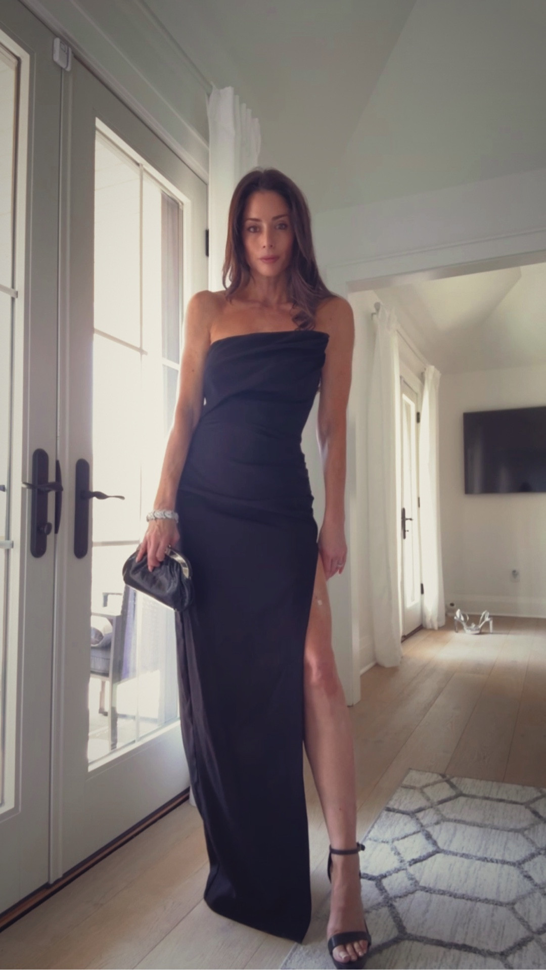 Elegant with a side of edge—timeless black tie style with just enough statement. Comment SHOP this dress and similar long dresses with a slit🖤🖤

#LTKOver40 #LTKWedding #LTKSeasonal