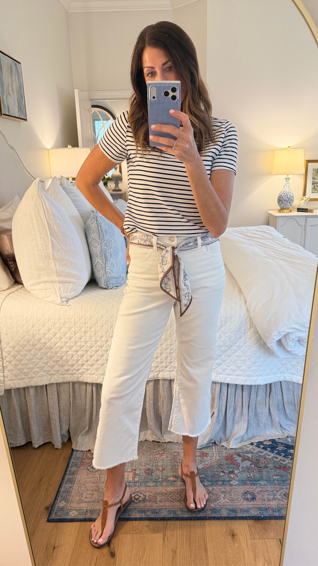 When in doubt, add a scarf! I rarely wear scarves around my neck because I just get too hot (keeping it real!) but I love using them as belts or a handbag accessory 🥰! The price of this scarf & striped tee will blow your mind, paired with a favorite high rise cropped white jean from @jcrewfactory! Easy spring/summer look for casual days! Wearing size S in top, size 26 in jeans.

#LTKootd #LTKmomlife #LTKOver40